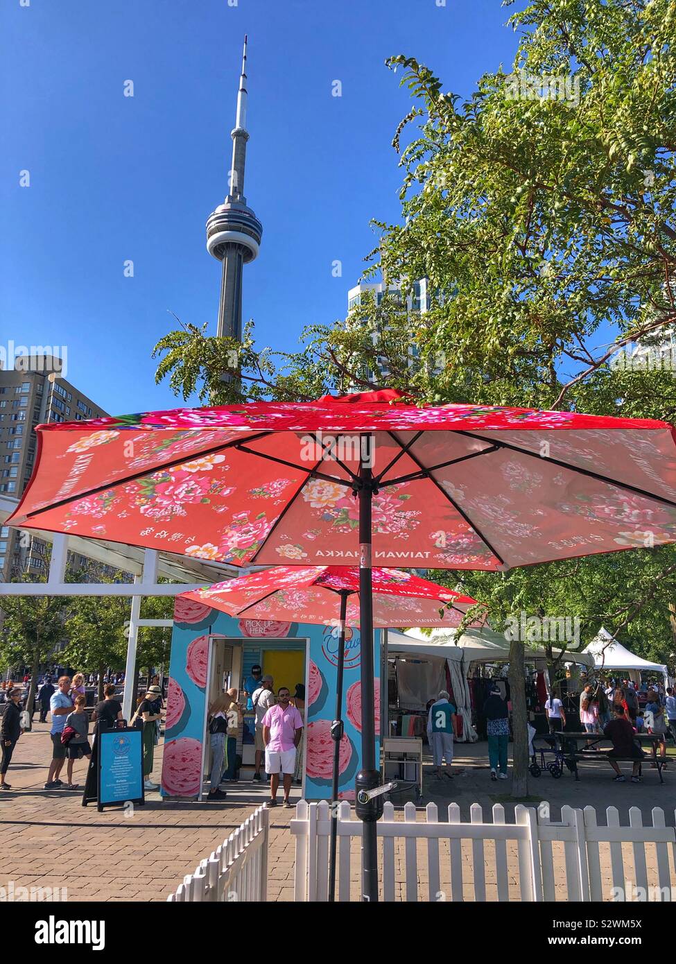 A view of the iconic CN Tower from Harbourfront Centre in Toronto. - Smartphone Captured Stock Image