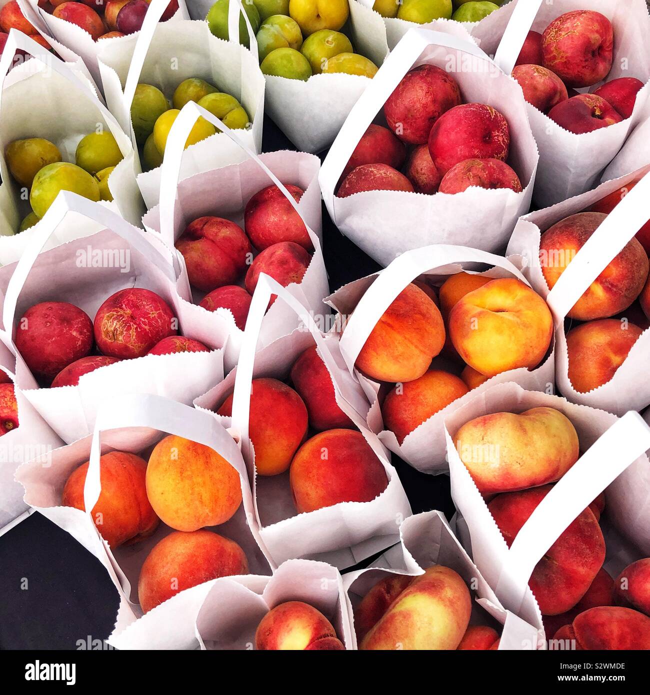 Peaches and plums at the farmers market Stock Photo Alamy