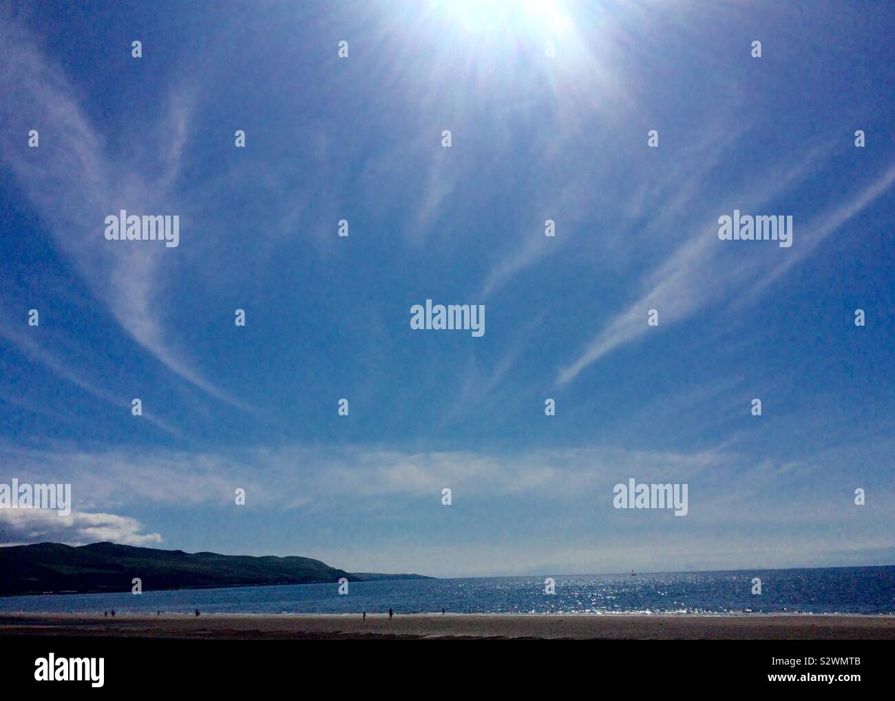 Sunny day at the beach Stock Photo - Alamy