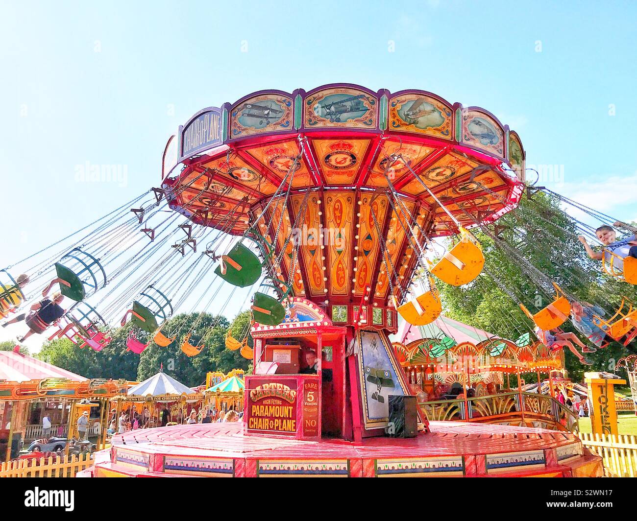 Merry go round swing hi-res stock photography and images - Alamy
