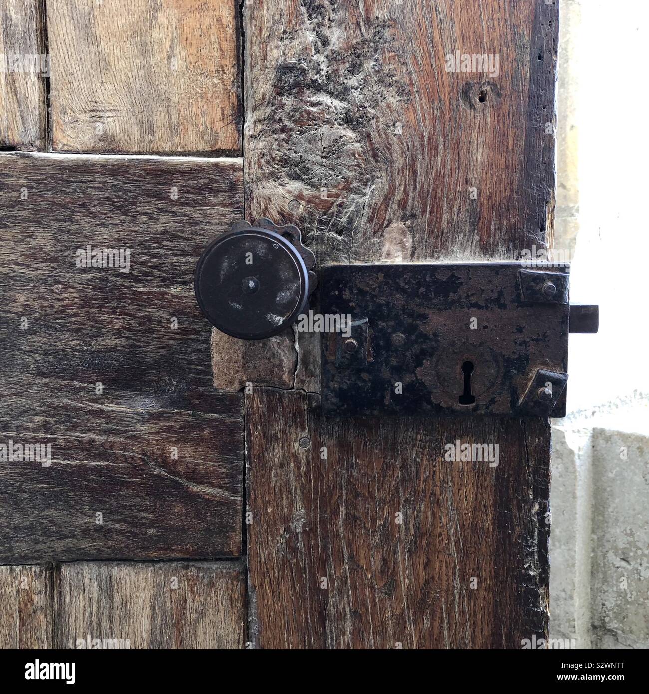 Very old wooden door with metal lock Stock Photo - Alamy
