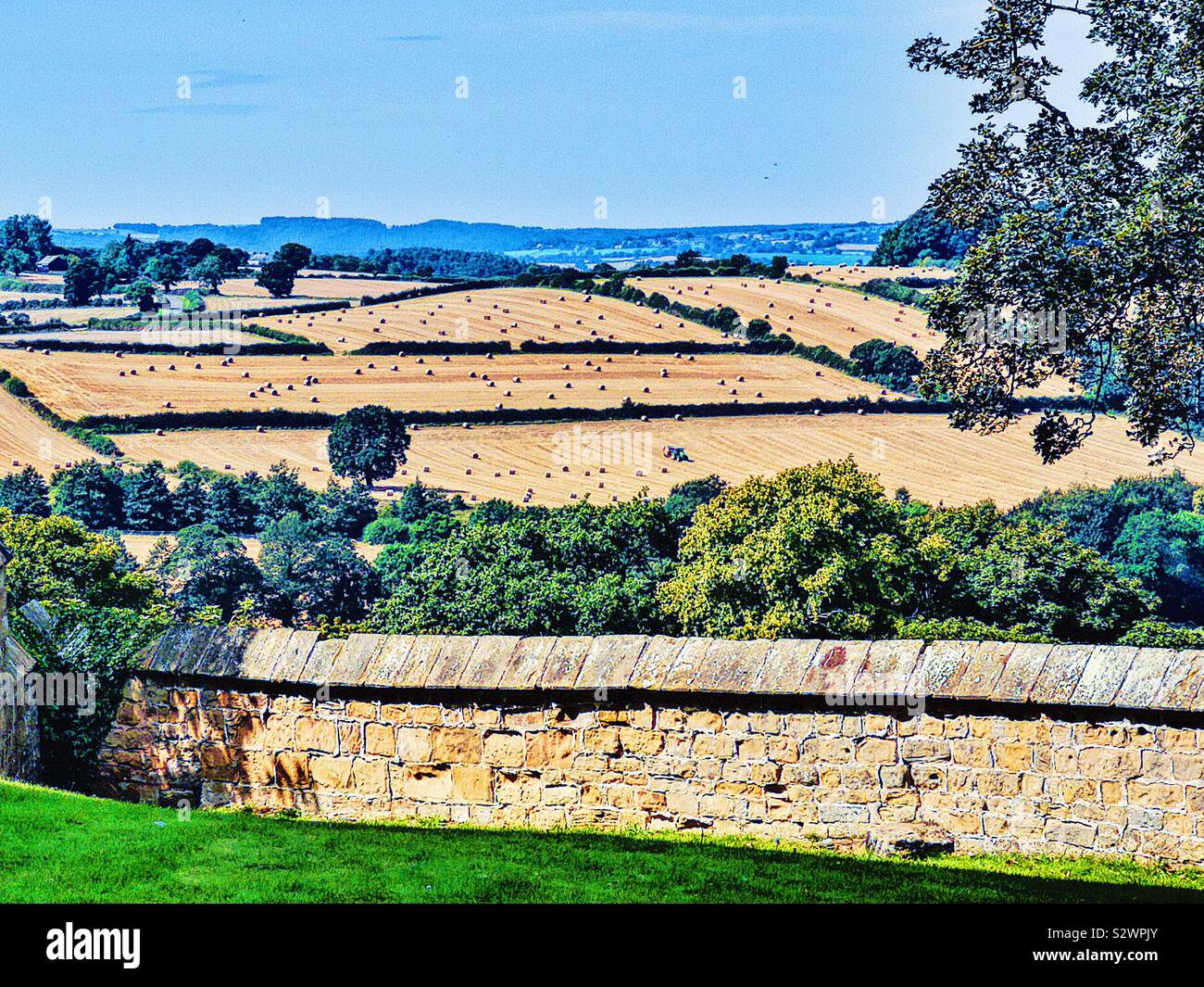 English landscape country scene with fields and hay bales Stock Photo