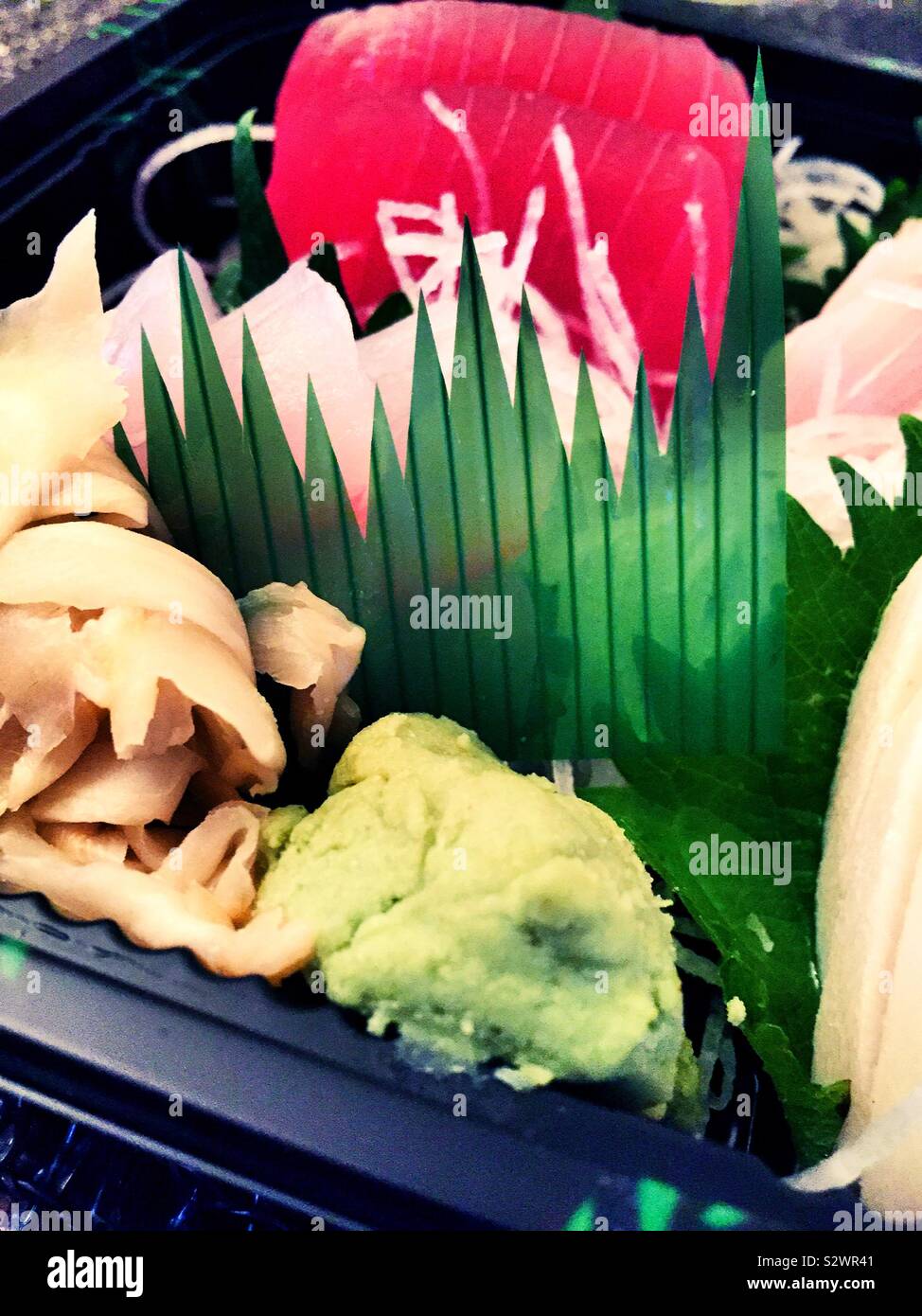 Sashimi dinner in a plastic delivery box - Smartphone Captured Stock Image