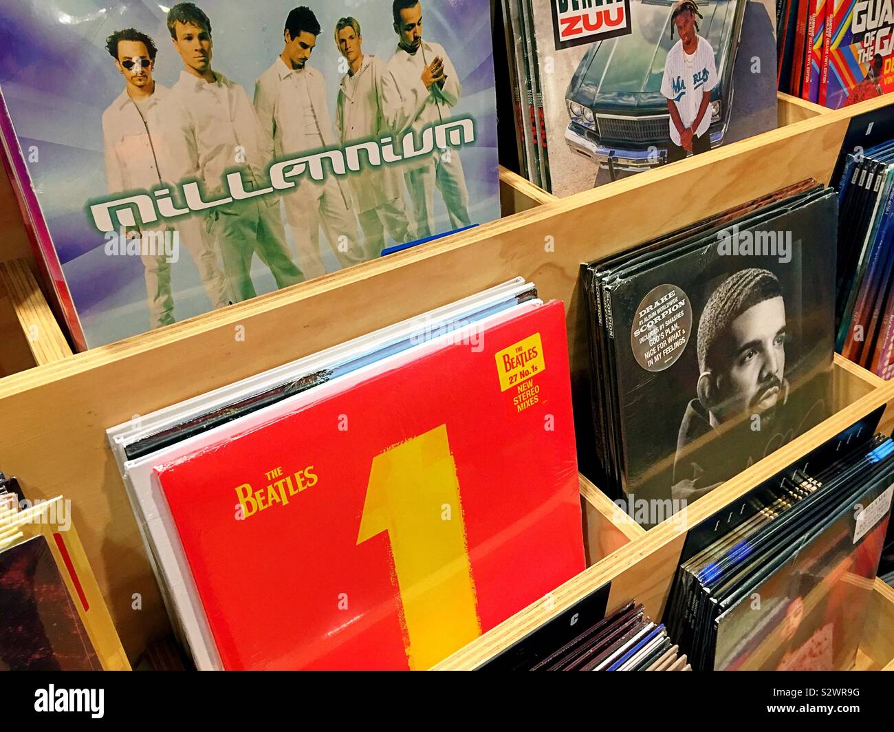 The Beatles number one album is among many vinyl records displayed in a New York City retail store, USA - Smartphone Captured Stock Image