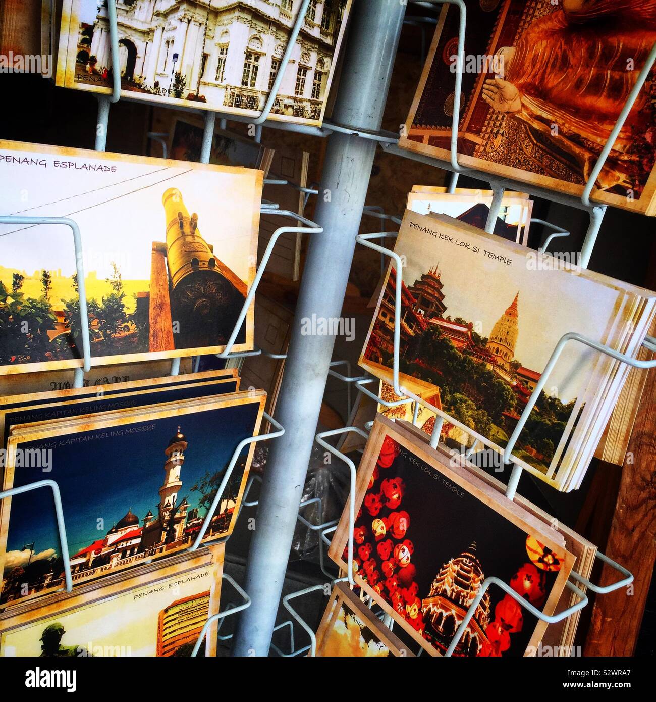 Postcards of city scenes for sale, George Town, Penang, Malaysia - Smartphone Captured Stock Image