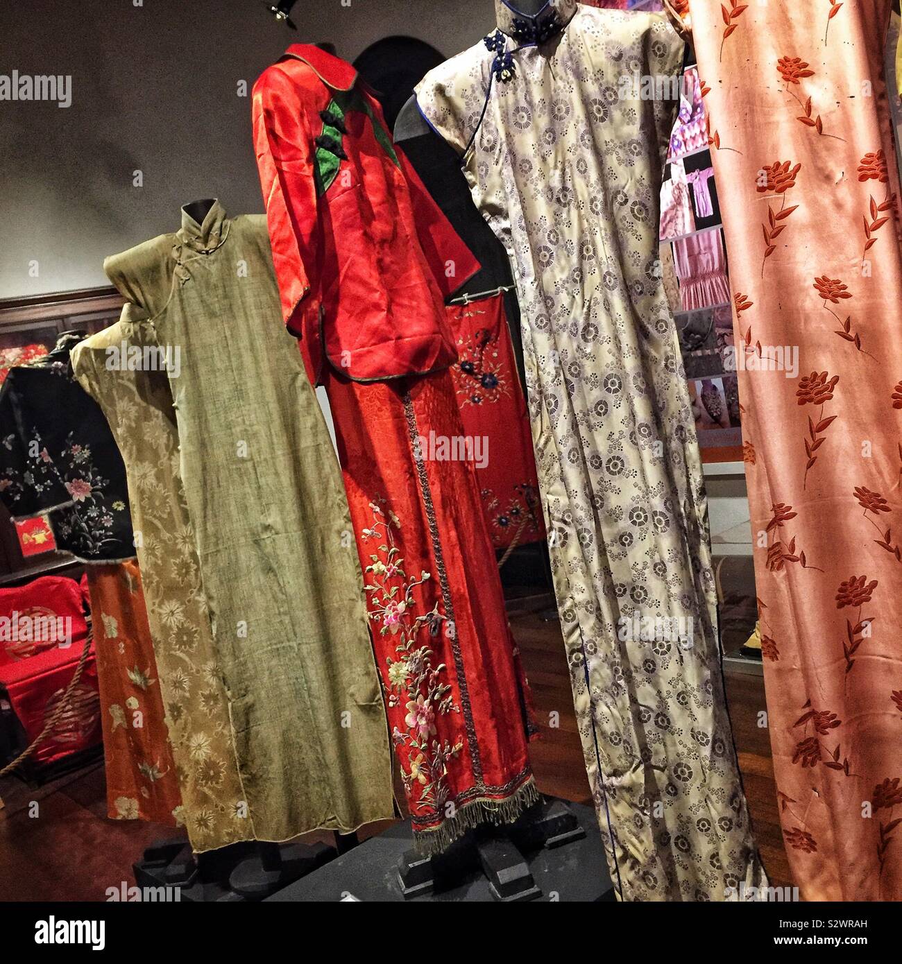 Vintage Chinese gowns found, and now on display in, Cheong Fatt Tze (aka The Blue Mansion), a late 19th century Chinese mansion now restored as a boutique hotel, George Town, Penang, morning Malaysia - Smartphone Captured Stock Image