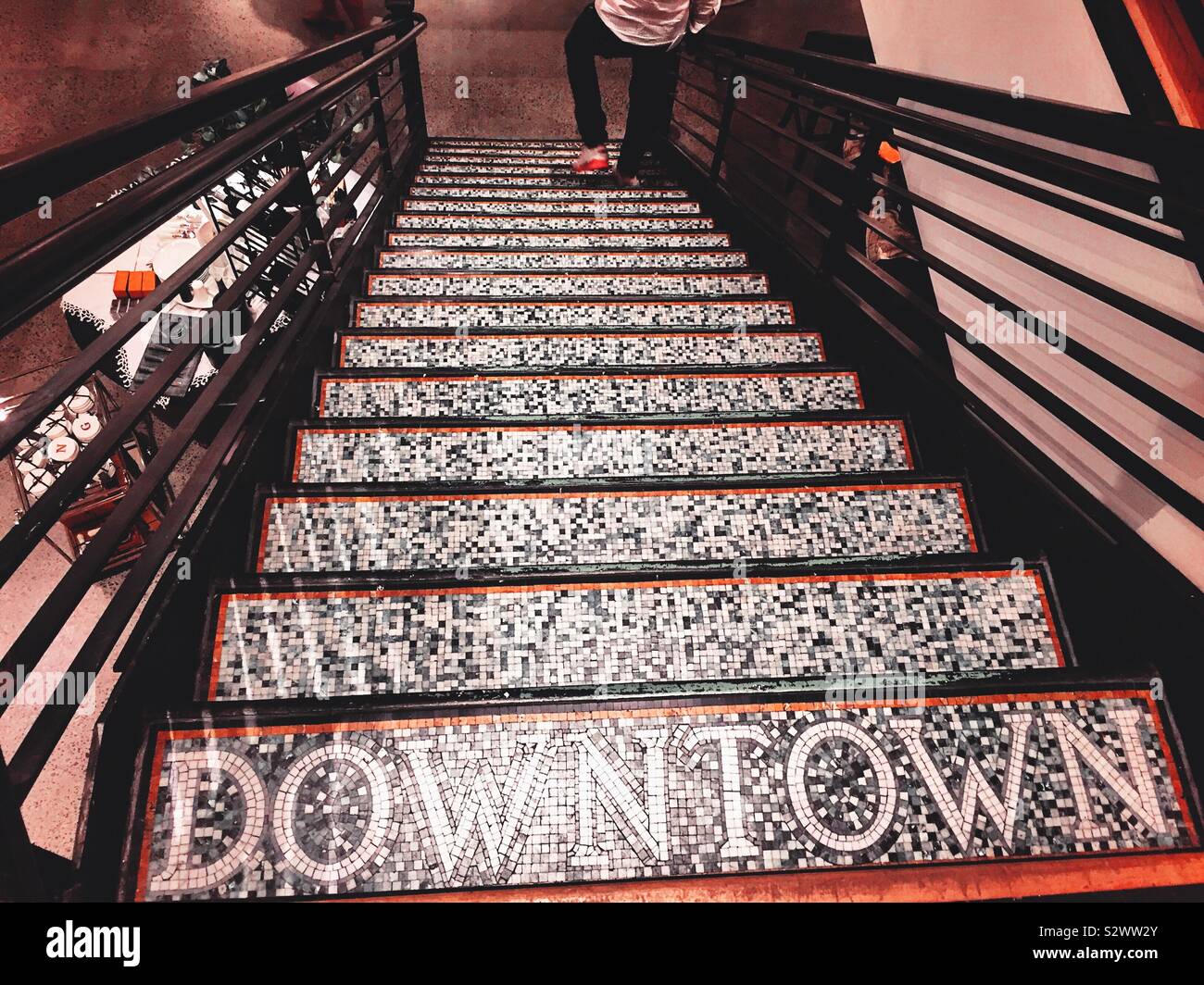 Downtown labeled staircase leading to the lower level of the pottery barn  in the flatiron district, Manhattan, NYC, USA Stock Photo - Alamy