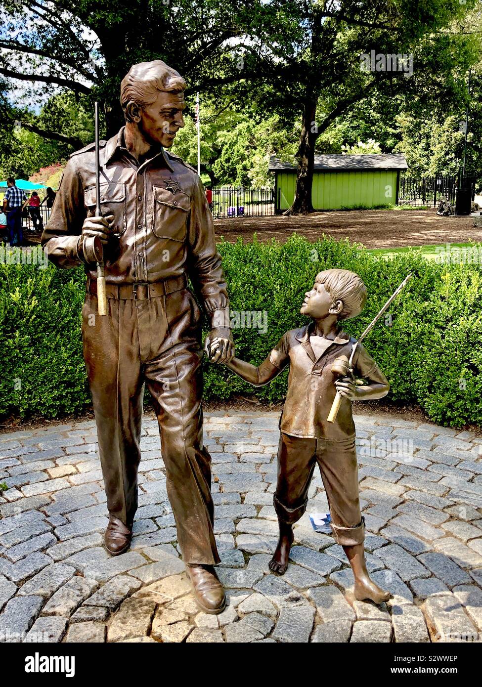 Andy Griffith and Opie statue at Pullen Park North Carolina commemorating 1960’s tv-show and a simpler life and time Stock Photo