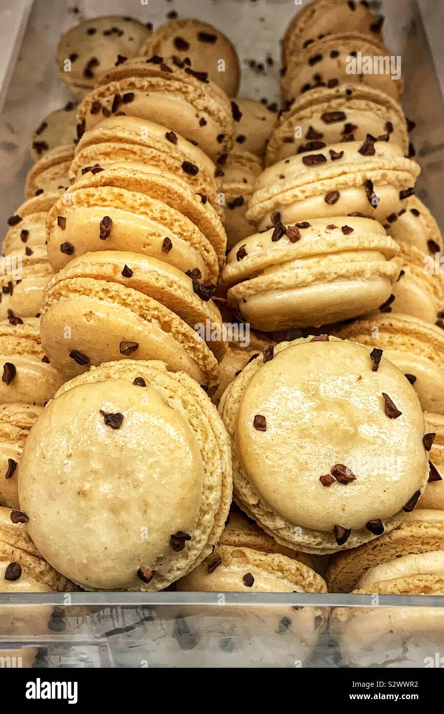 Delicious tasty fresh chocolate chip macaroons cookie sandwiches. Stock Photo
