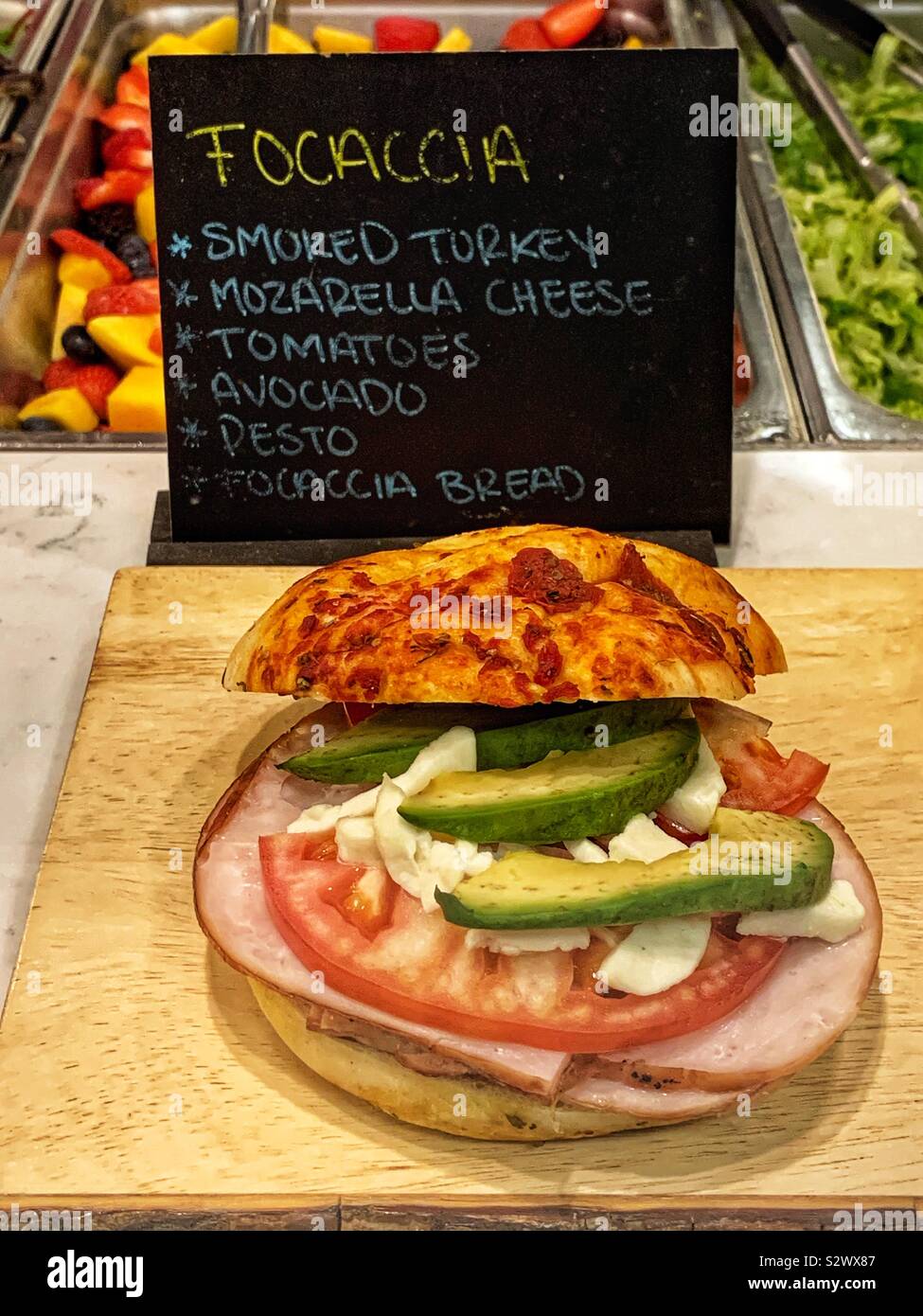 Focaccia sandwich with smoked turkey, mozzarella cheese, tomatoes