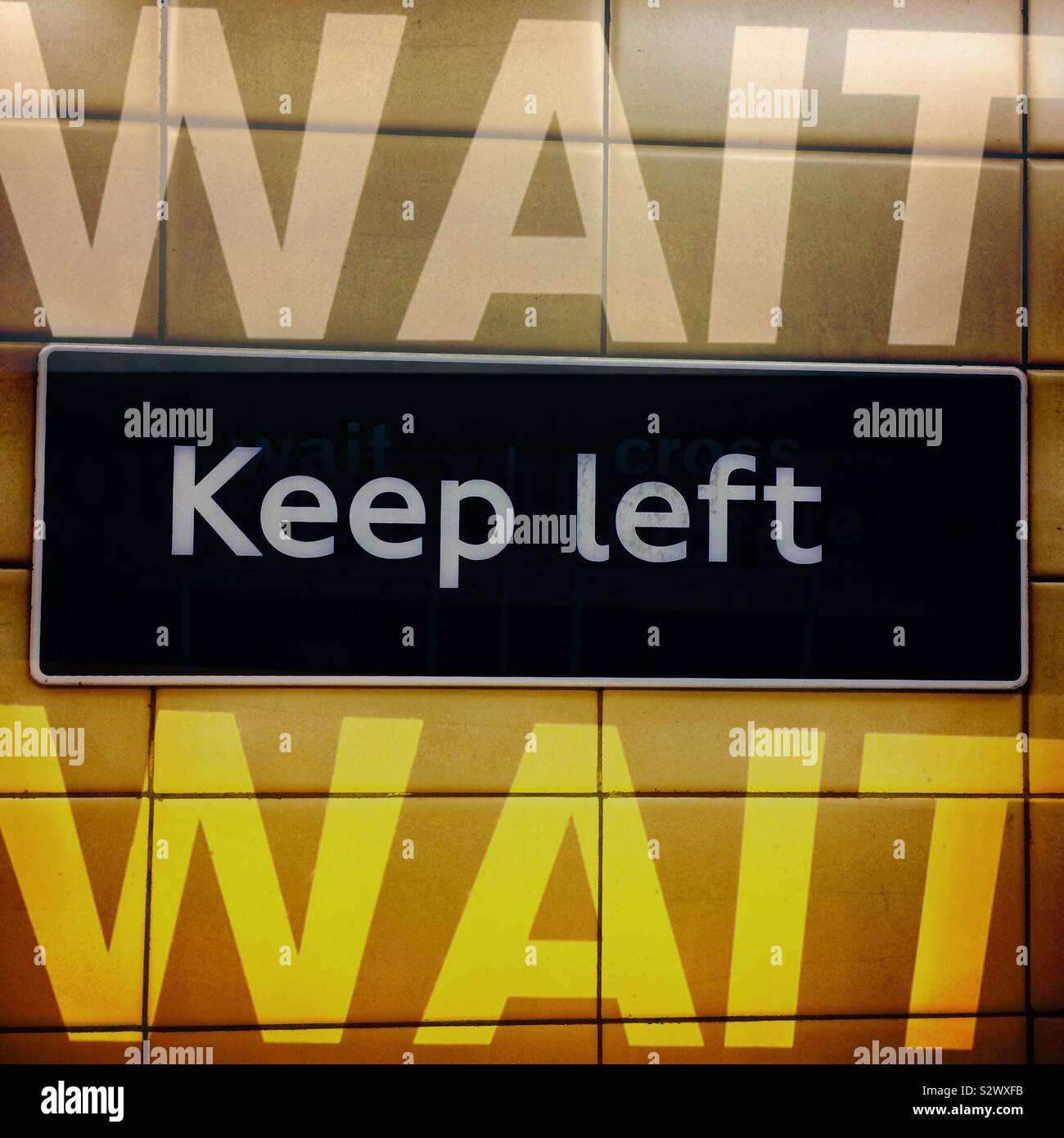 Keep keft and wait signages - Smartphone Captured Stock Image