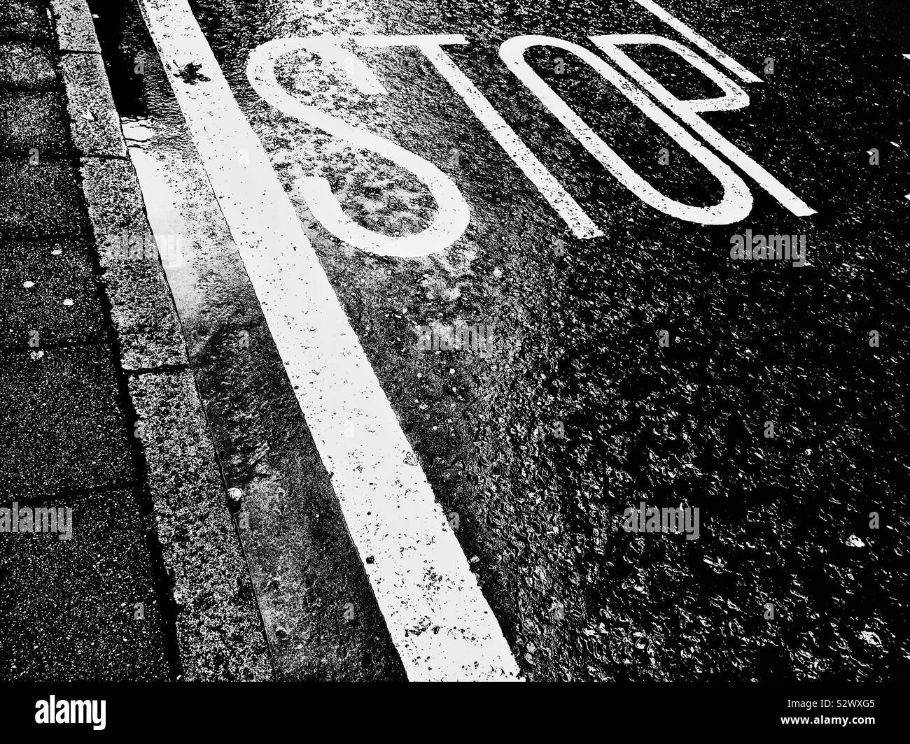 Stop sign on asphalt. London, UK Stock Photo
