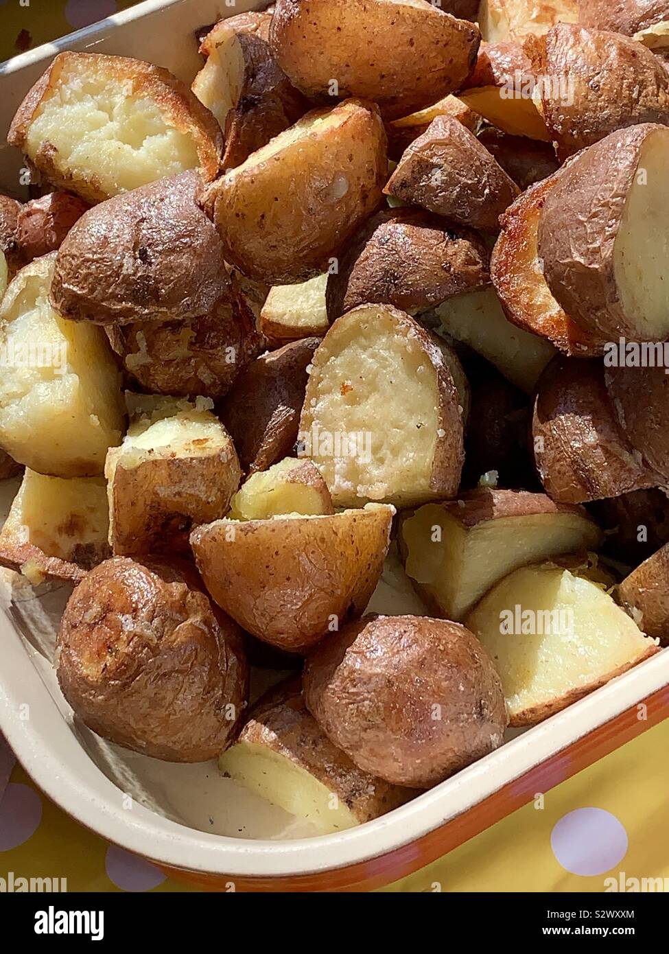 Roast potatoes in tray - Smartphone Captured Stock Image