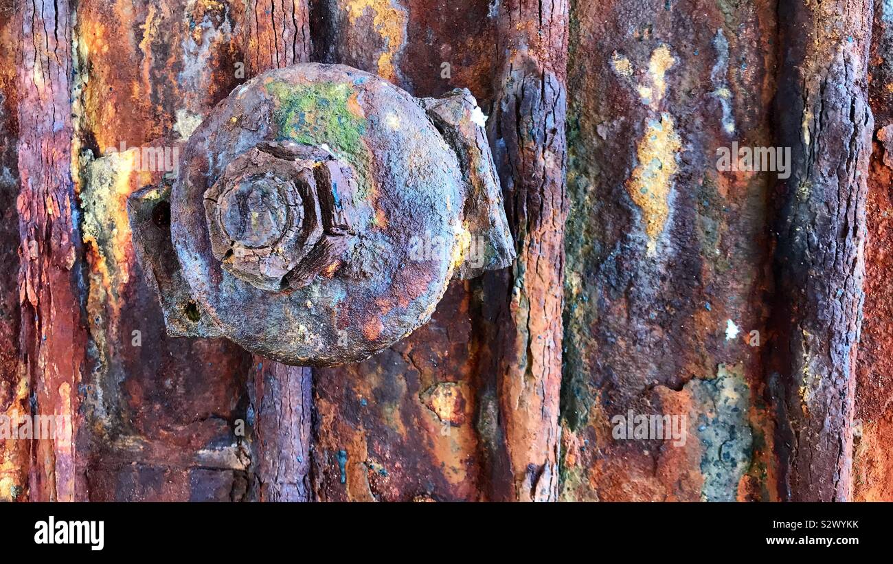 Rusted bolt on the remains of an oil rig out of service in Goleta California - Smartphone Captured Stock Image