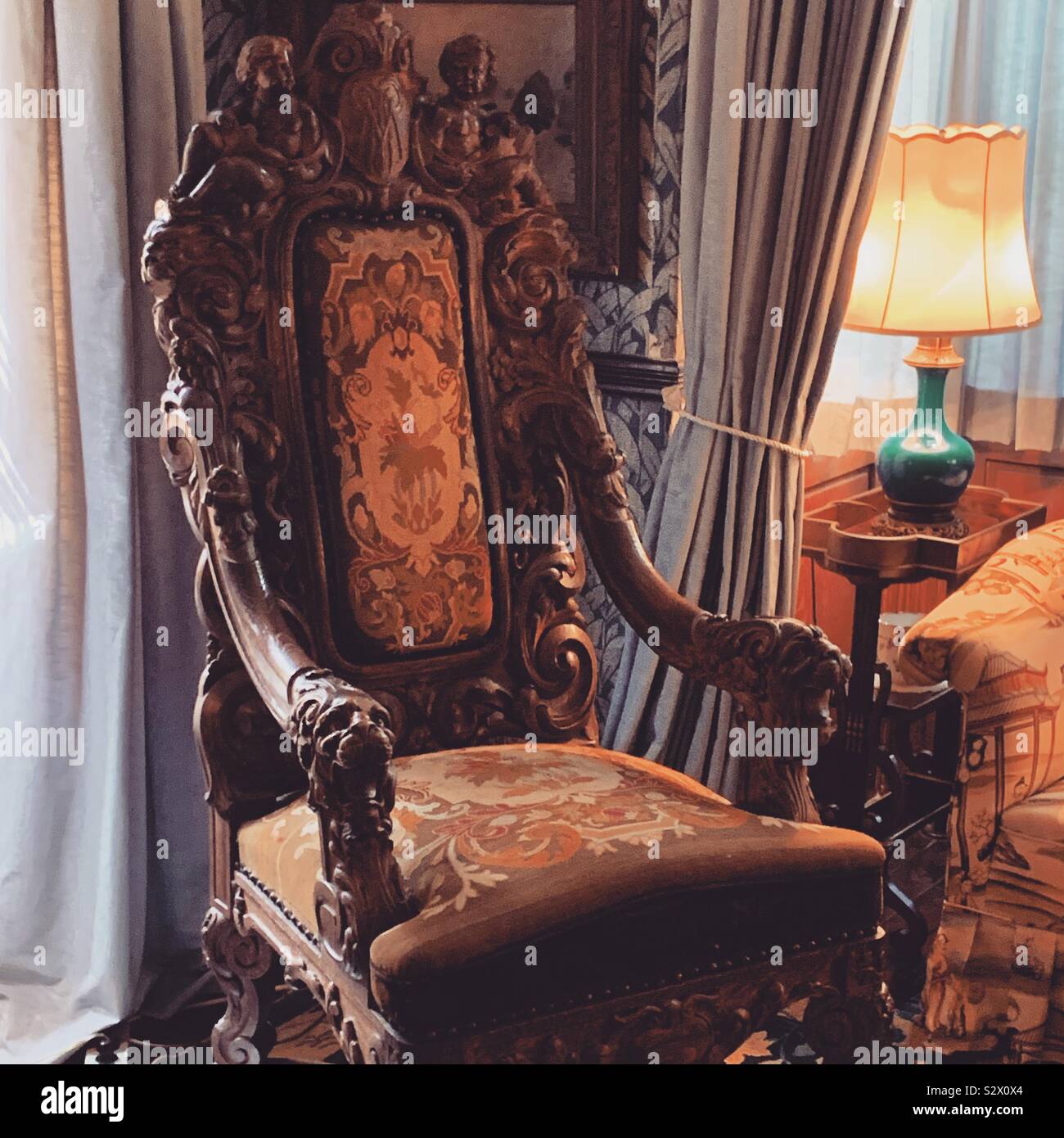 An ornate chair inside Kingscote mansion, Newport, Rhode Island, United States - Smartphone Captured Stock Image