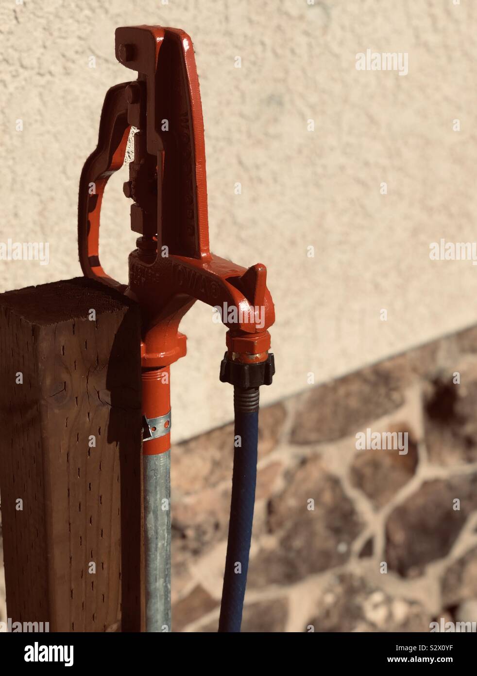 Yard hydrant and hose Stock Photo Alamy