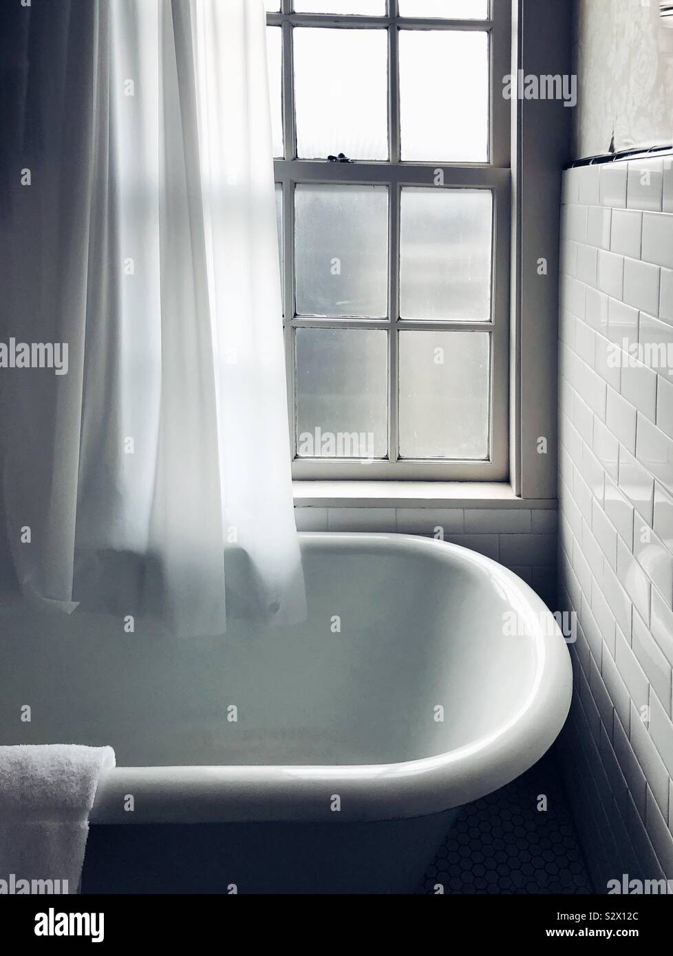 Dreamy vintage bathtub in the hotel Stock Photo Alamy