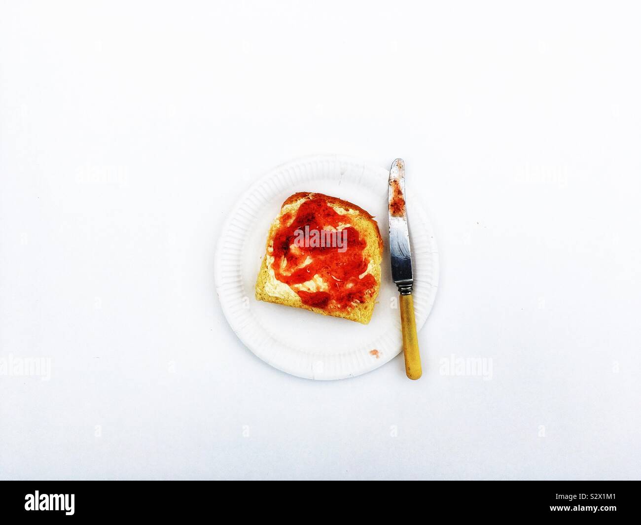 Slice of bread with strawberry jam - Smartphone Captured Stock Image