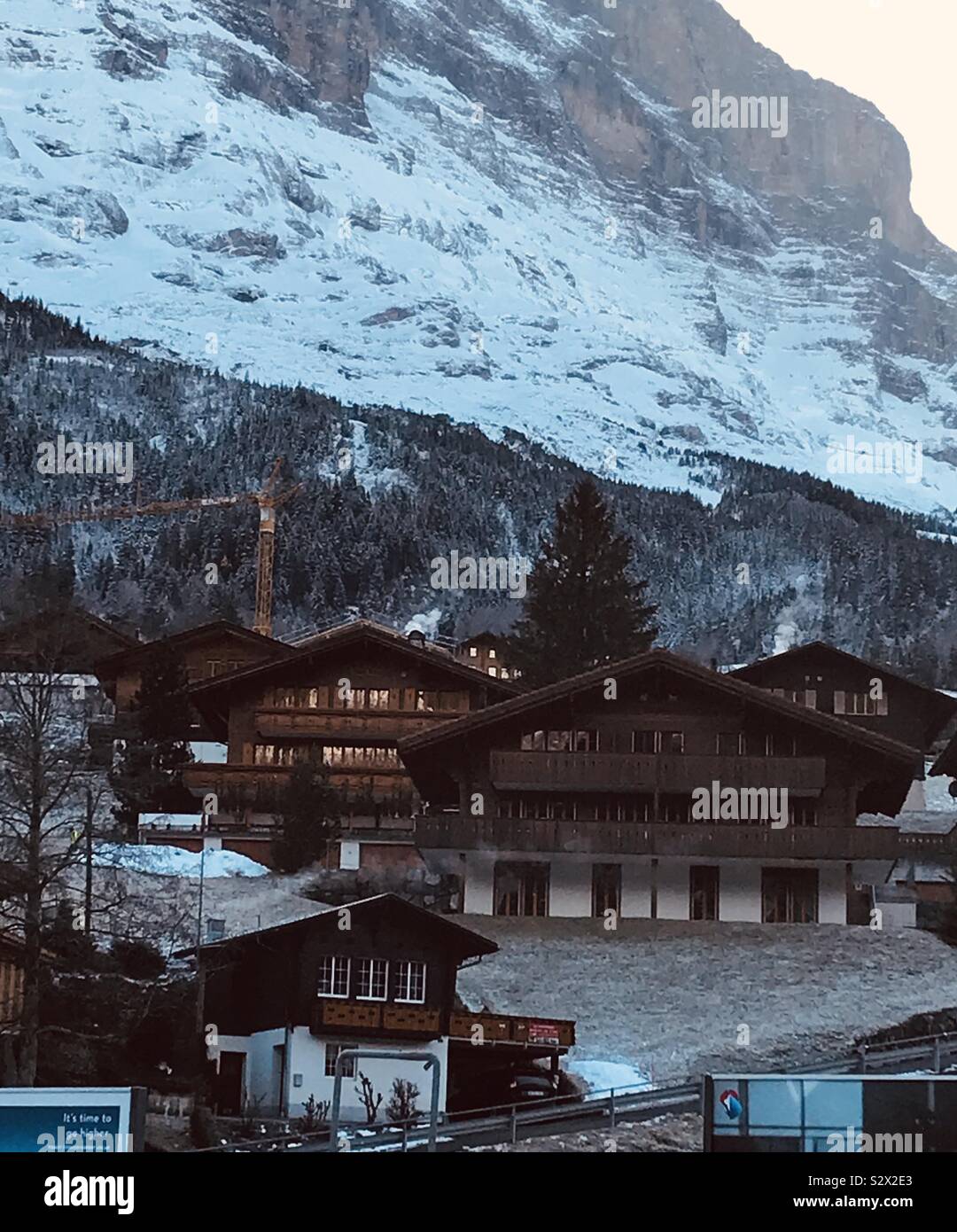 Swiss houses at Grindelwald, Switzerland. Christmas Day 2018. - Smartphone Captured Stock Image