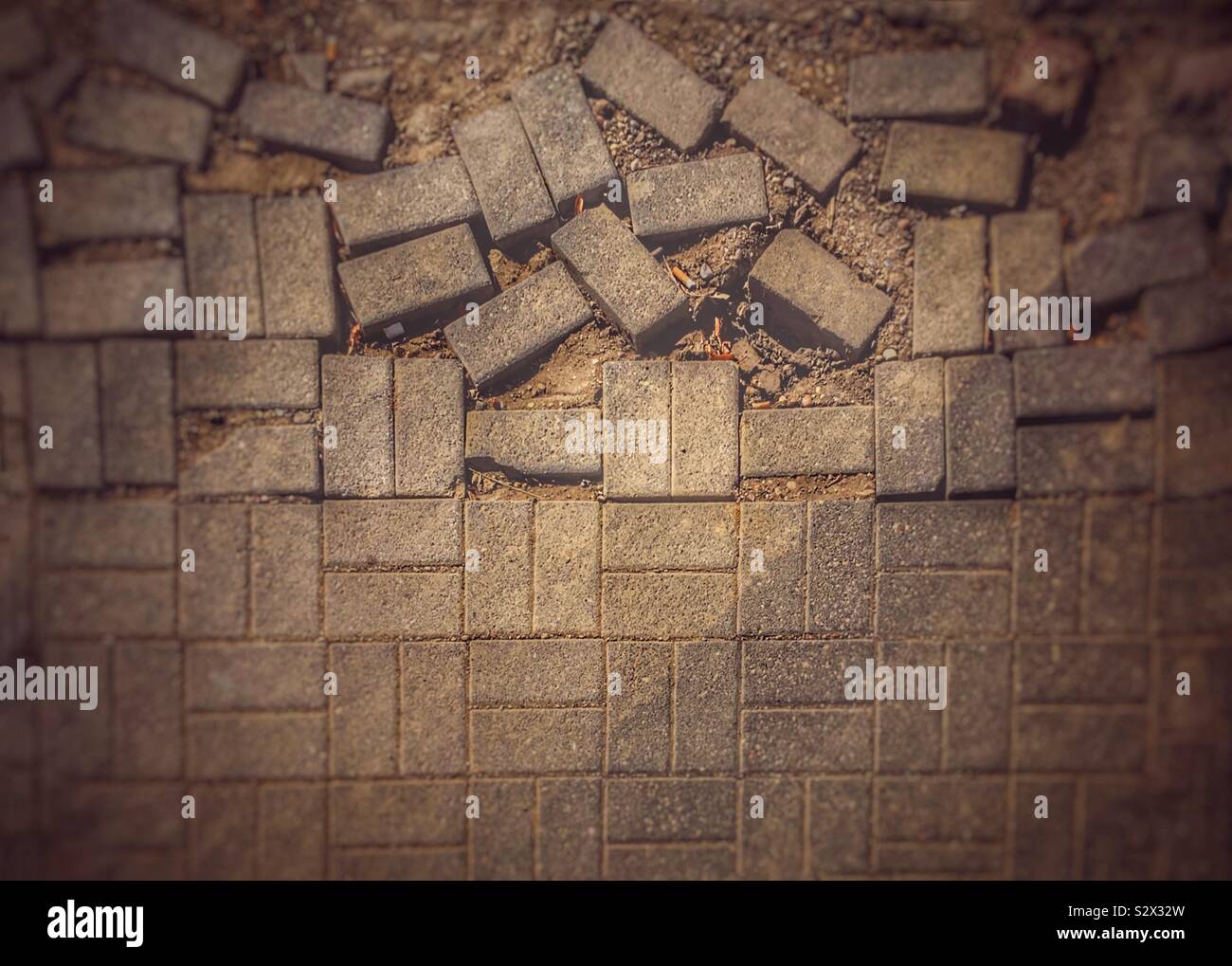 Brickwork falling apart into chaos - Smartphone Captured Stock Image