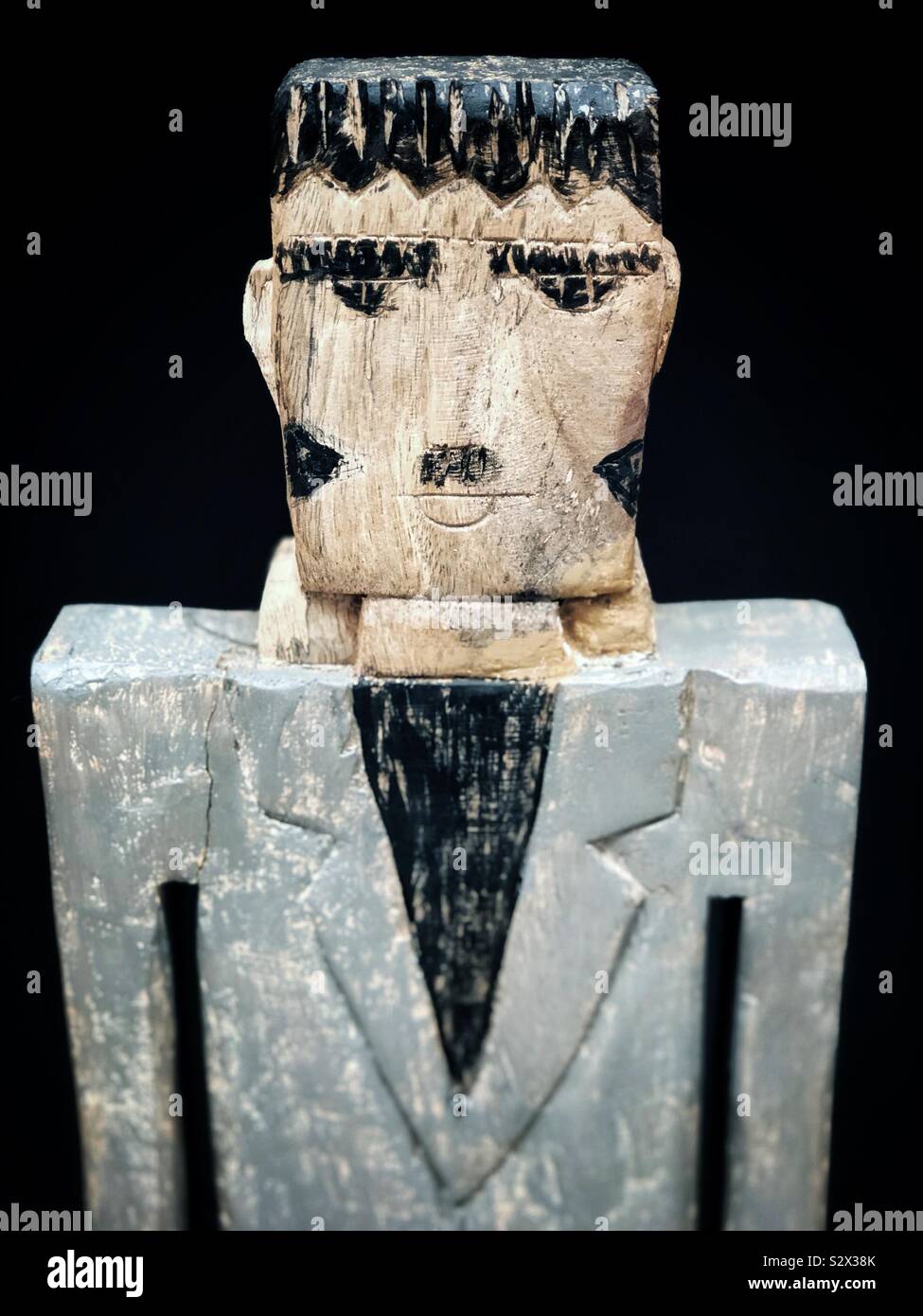 A wooden man that looks like Frankenstein - Smartphone Captured Stock Image