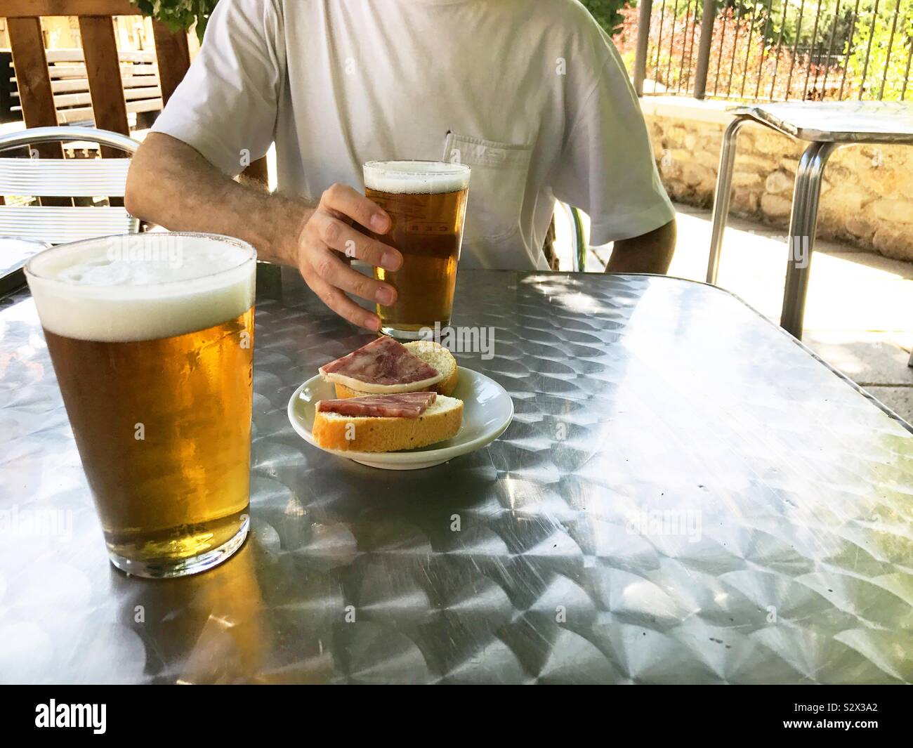 Beer with tapas in a terrace. Spain - Smartphone Captured Stock Image