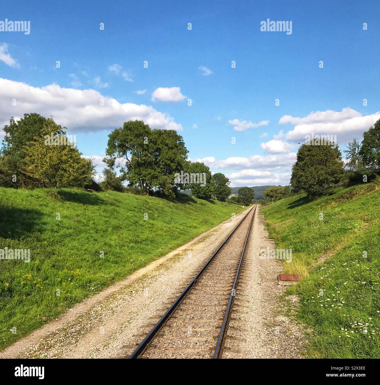 Single track railway line through countryside - Smartphone Captured Stock Image