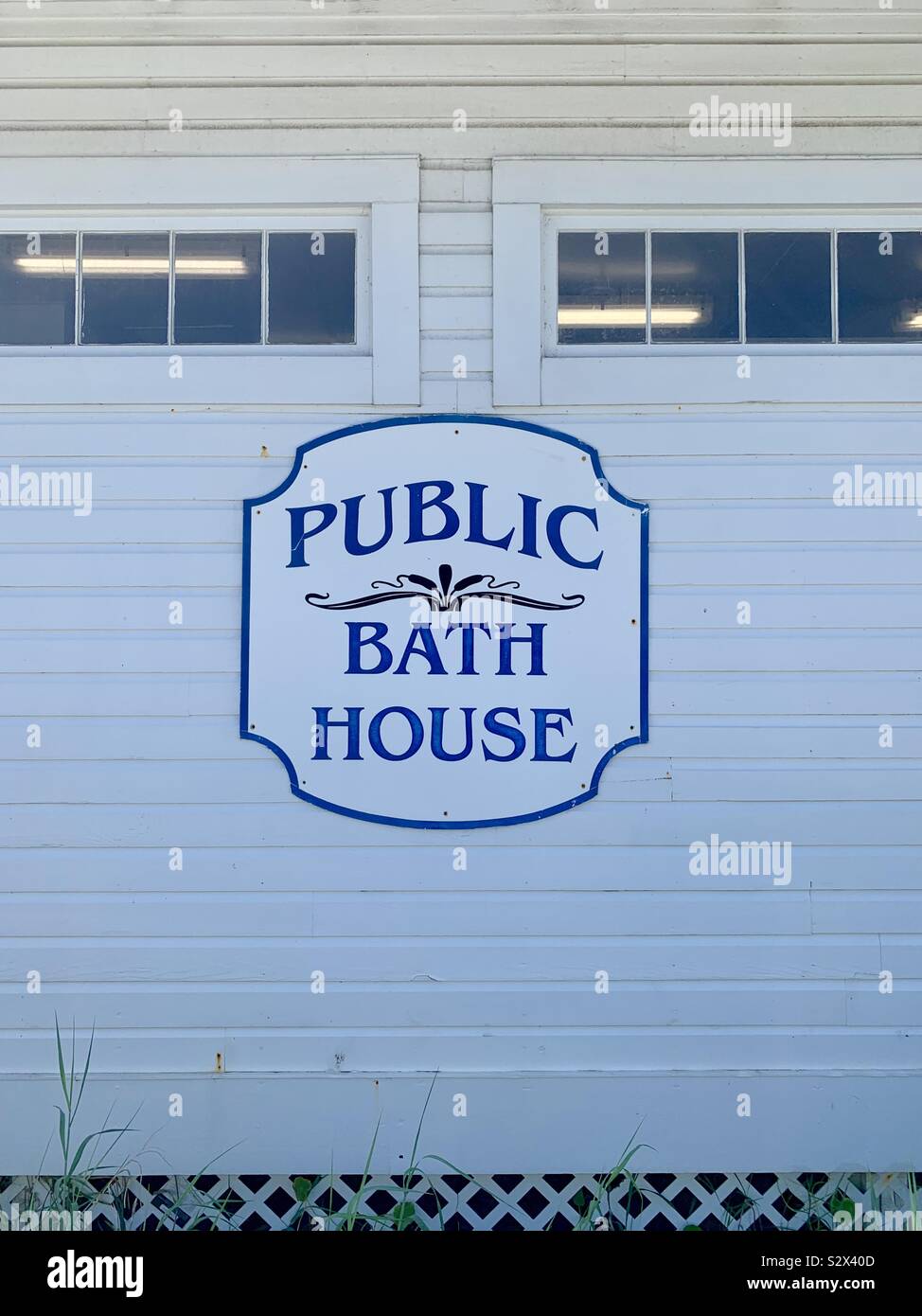 Public bath house sign and building on the beach - Smartphone Captured Stock Image Public bath house sign and building on the beach - Smartphone Captured Stock Image