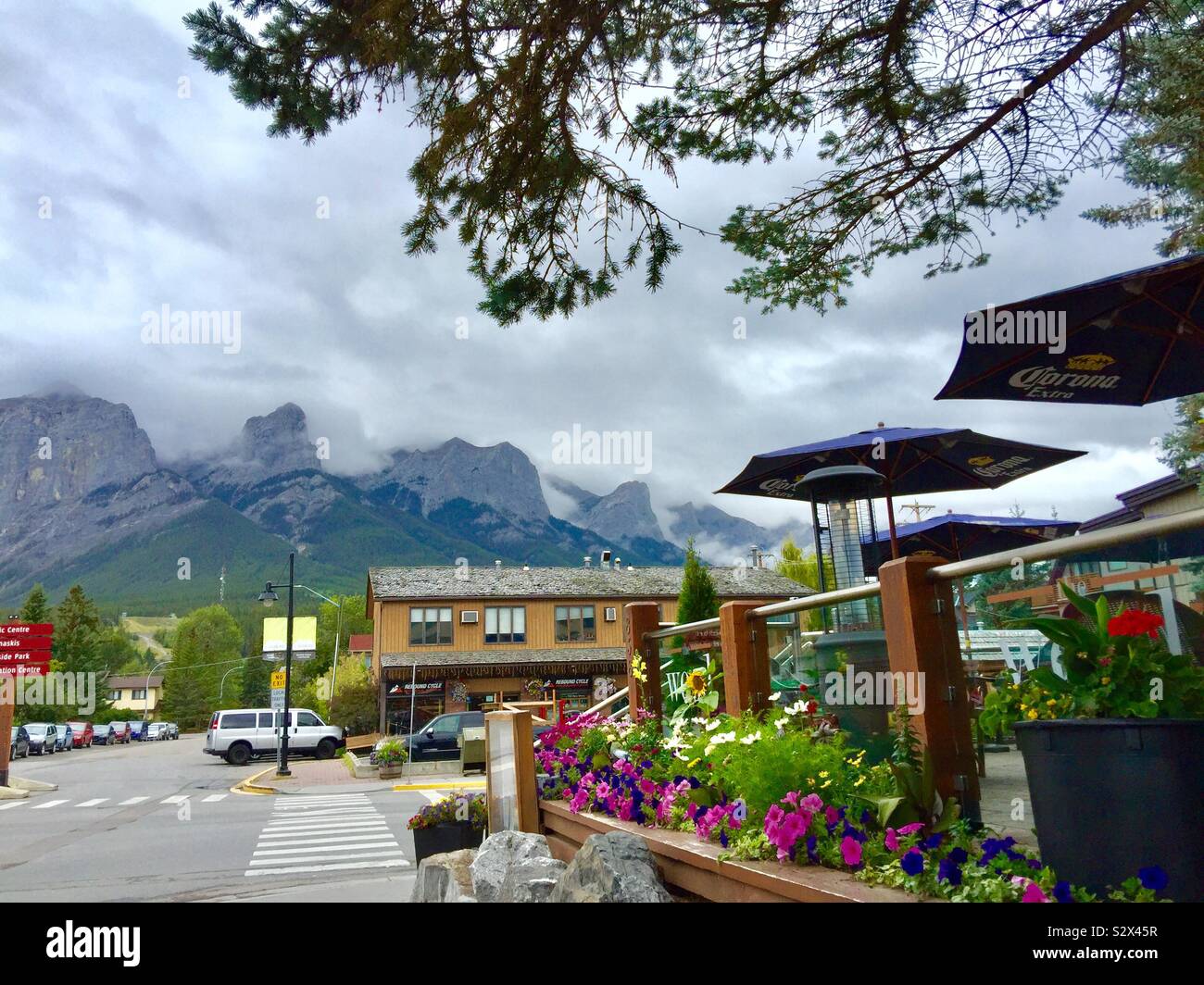 Street photo, Canmore, Alberta, Canada, rainy and cloudy Stock Photo ...