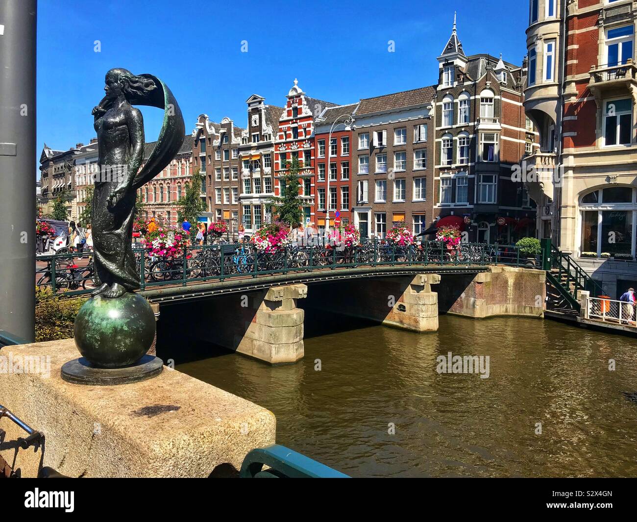 Amsterdam canal and bicycles Stock Photo