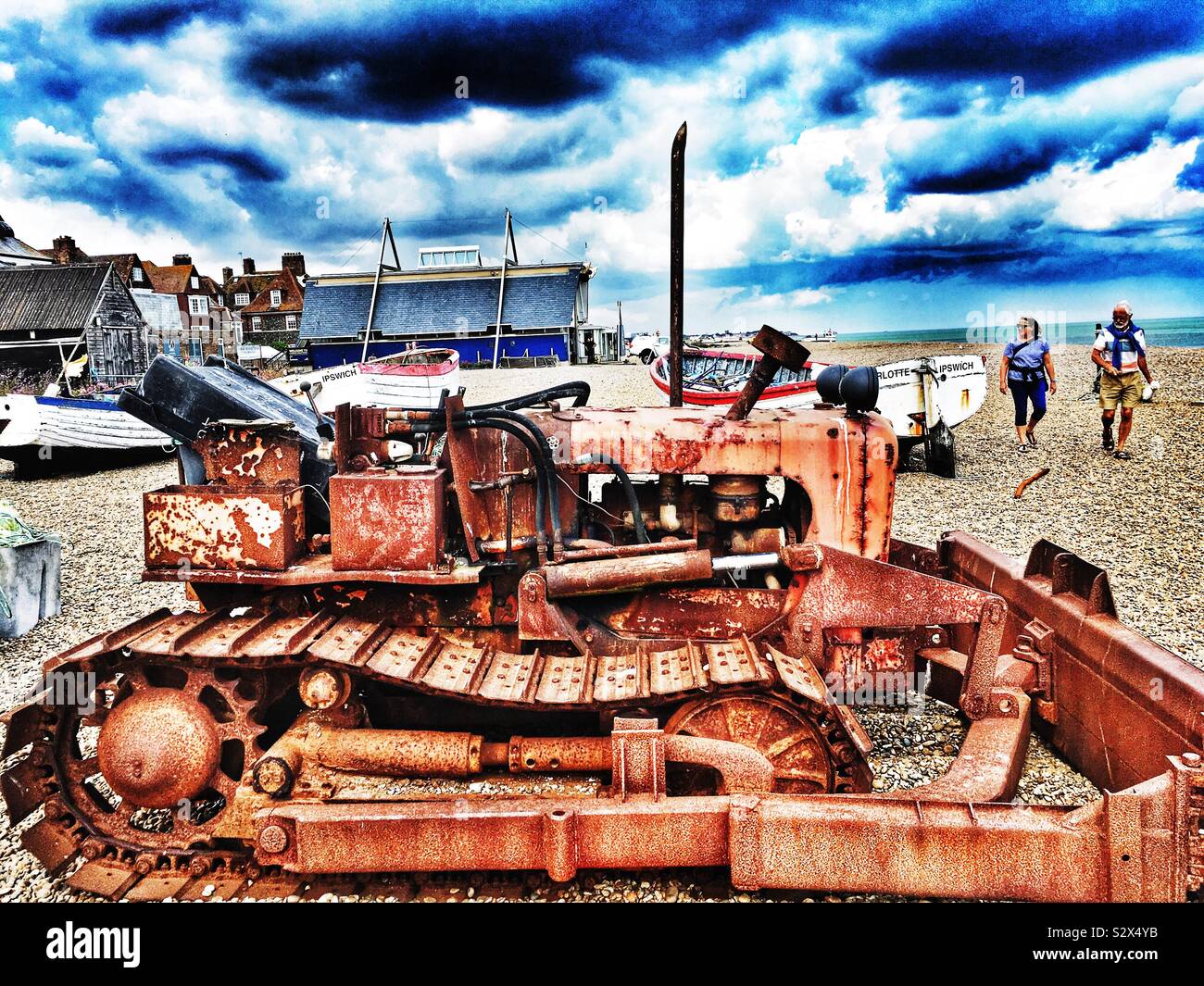 Caterpillar bulldozer used in the fishing industry, Aldeburgh, Suffolk, UK. - Smartphone Captured Stock Image
