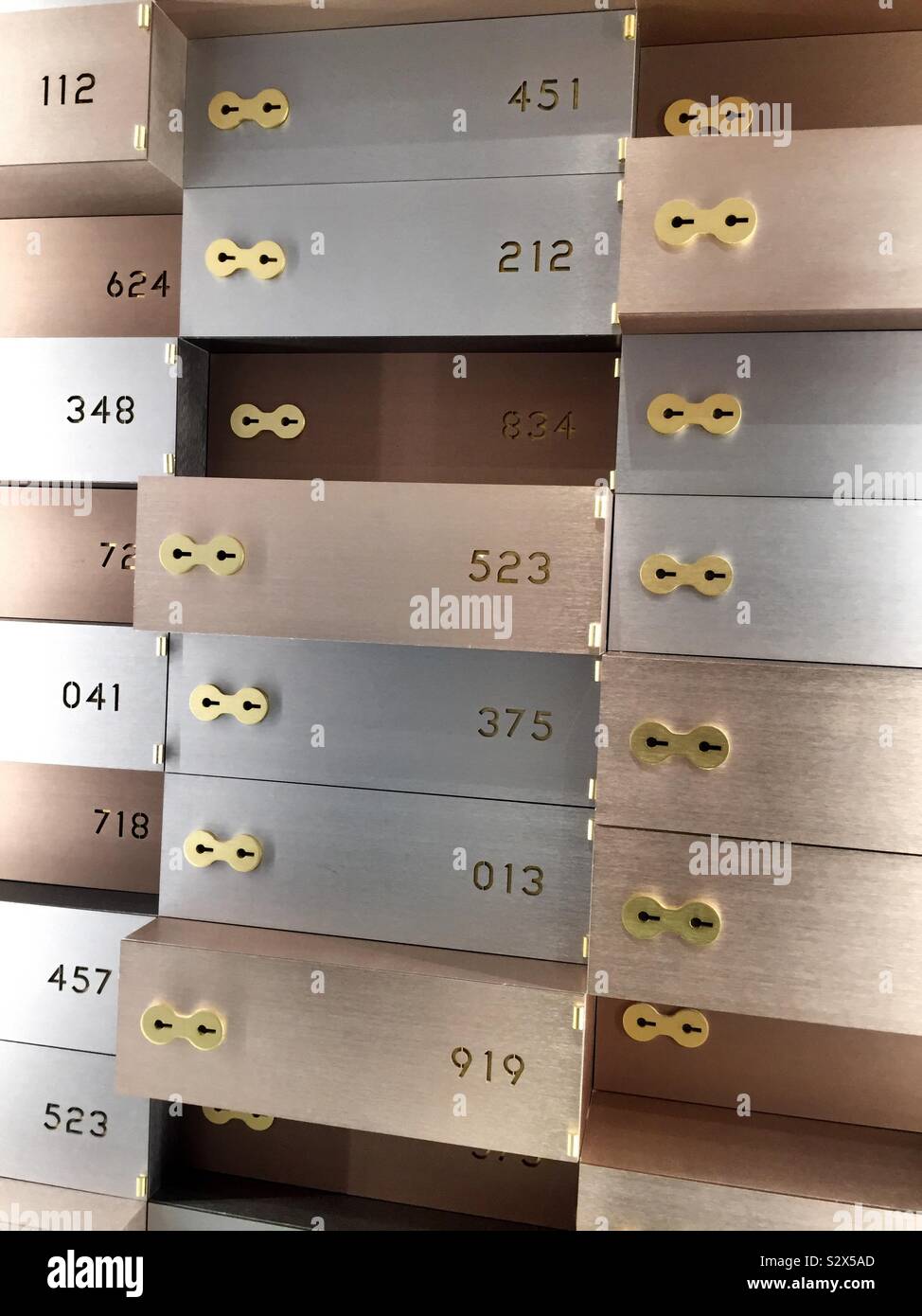 Safe deposit Box decor is in the Saks fifth Avenue high end jewelry department on the lower level of the Fifth Avenue flagship store in midtown Manhattan, NYC, USA - Smartphone Captured Stock Image