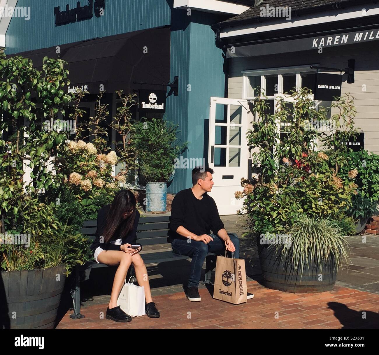 September 2019 The shopping experience at Bicester Village, Oxfordshire - Smartphone Captured Stock Image