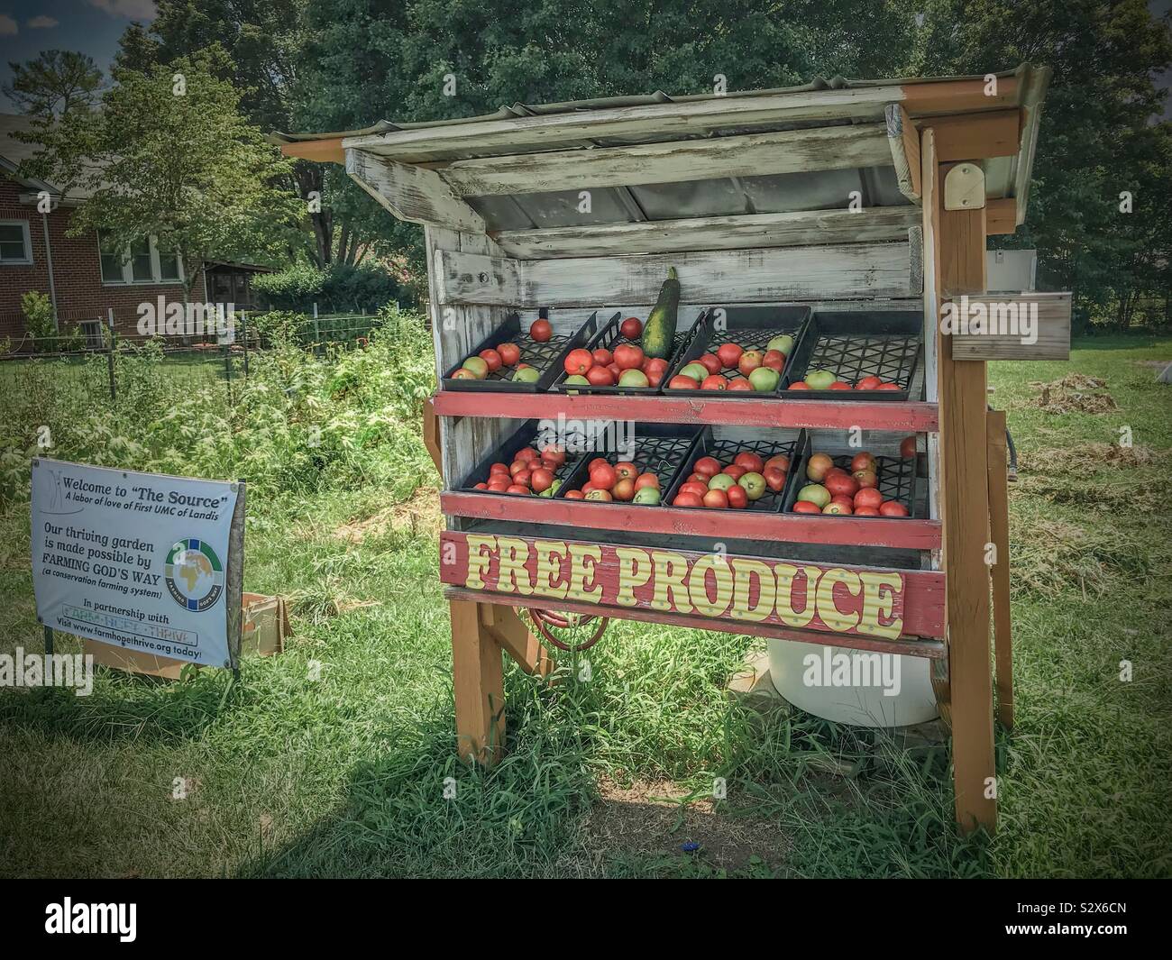 Free produce stand sponsored by local church in North Carolina beside