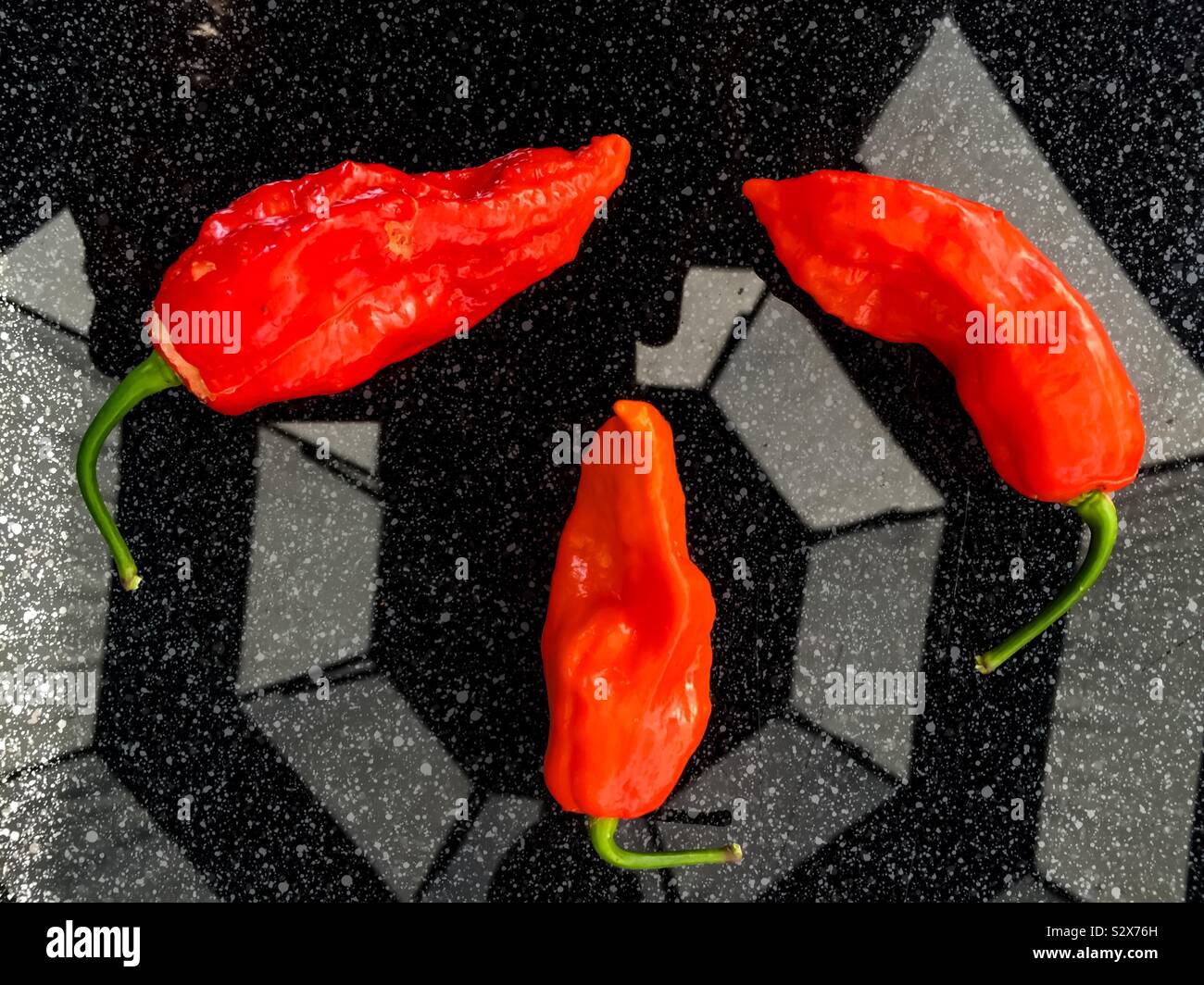 Red, very hot, Ghost Peppers - Smartphone Captured Stock Image