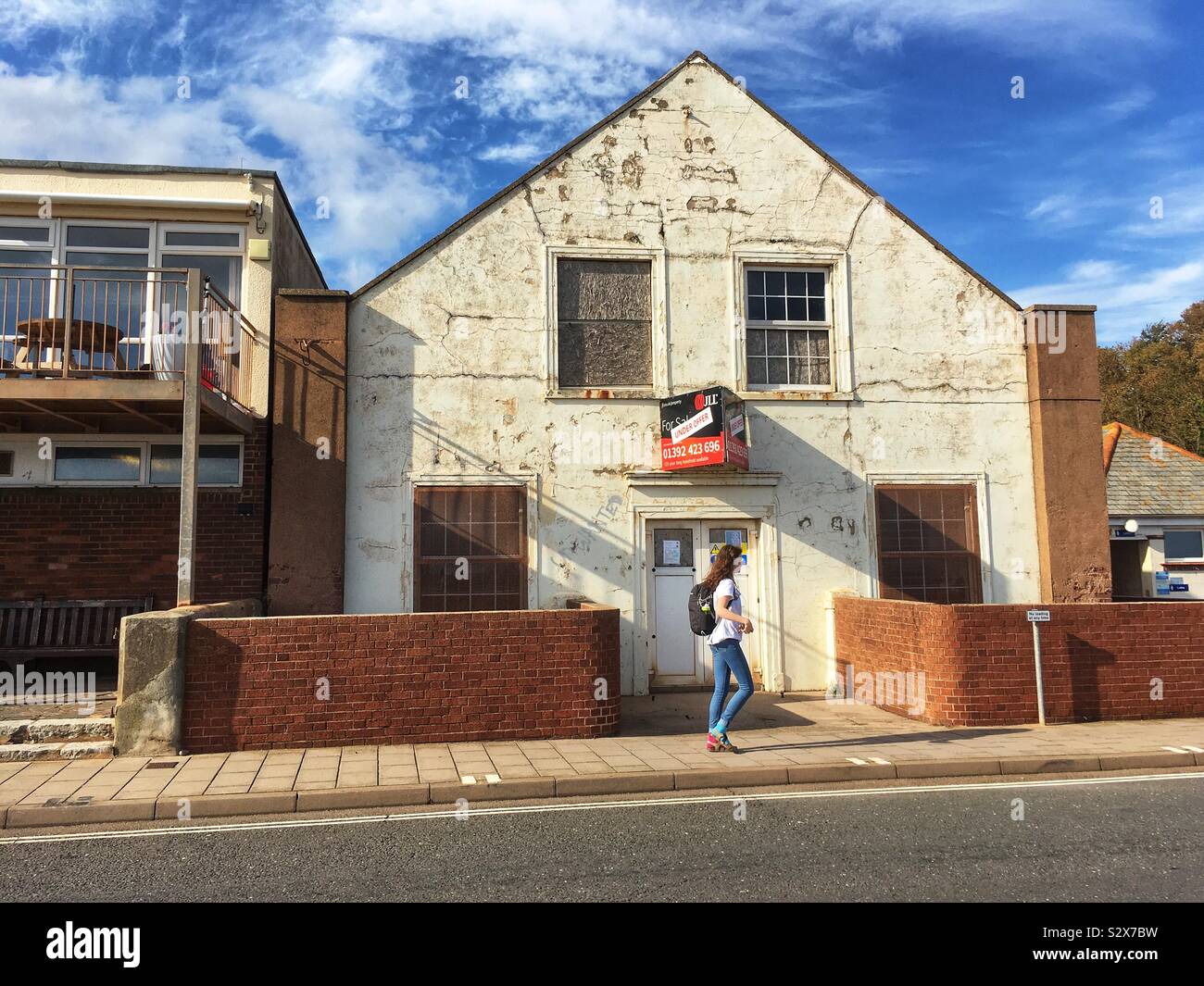 Empty property under offer on Sidmouth seafront in Devon, United Kingdom in August 2019 - Smartphone Captured Stock Image