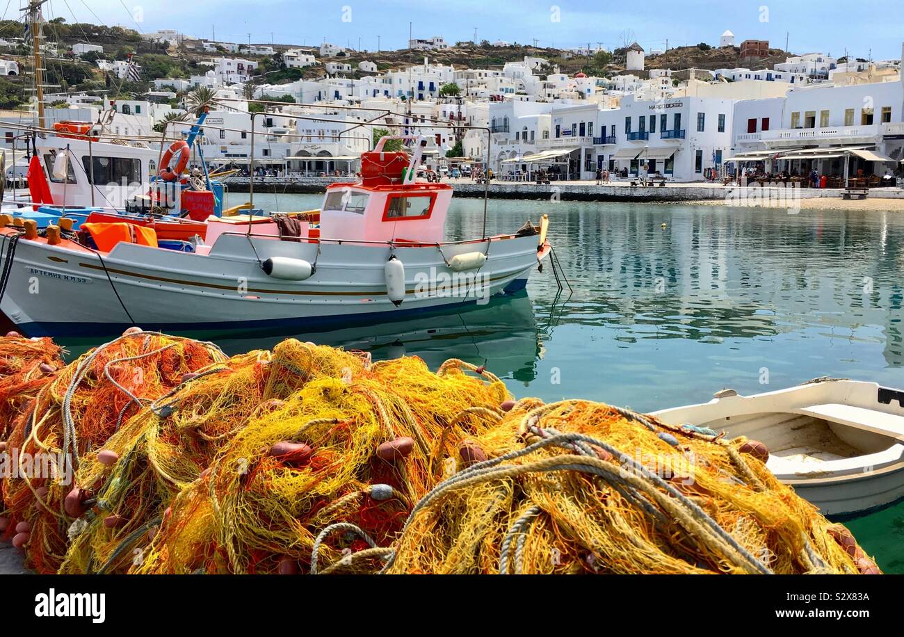 Mykonos Boatharbor with fishing nets, Cyclades islands, Greece. Stock Photo