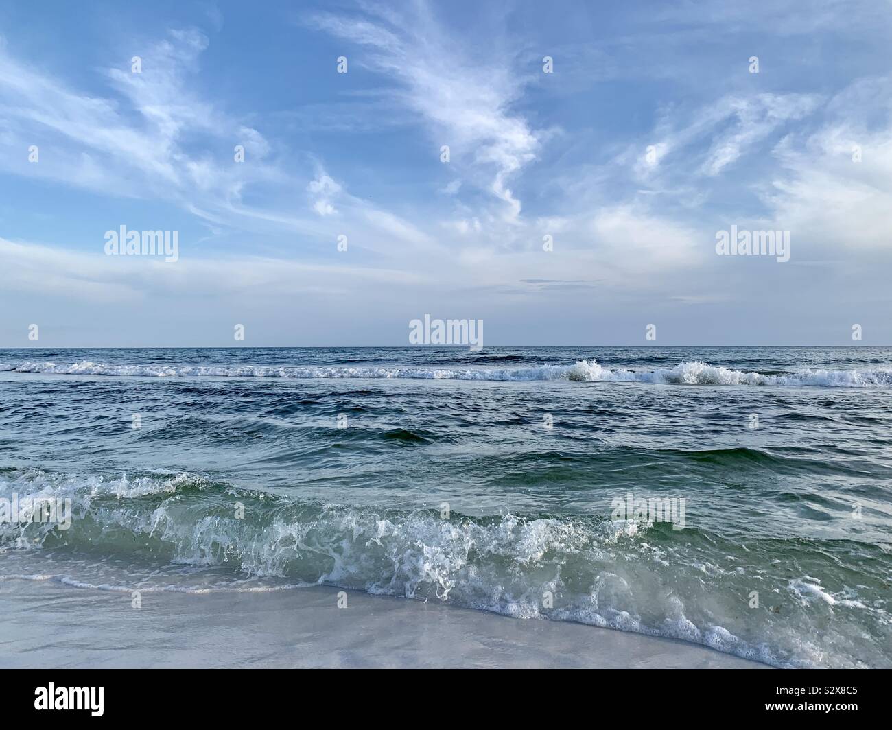 Ocean waves of the Gulf of Mexico with beautiful skies - Smartphone Captured Stock Image
