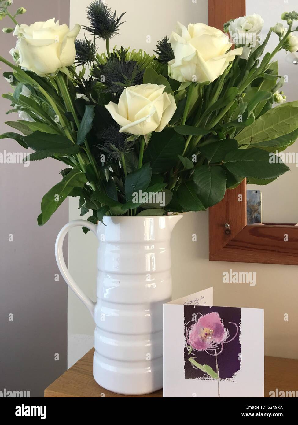 Gorgeous flowers in a white ceramic jug Stock Photo - Alamy