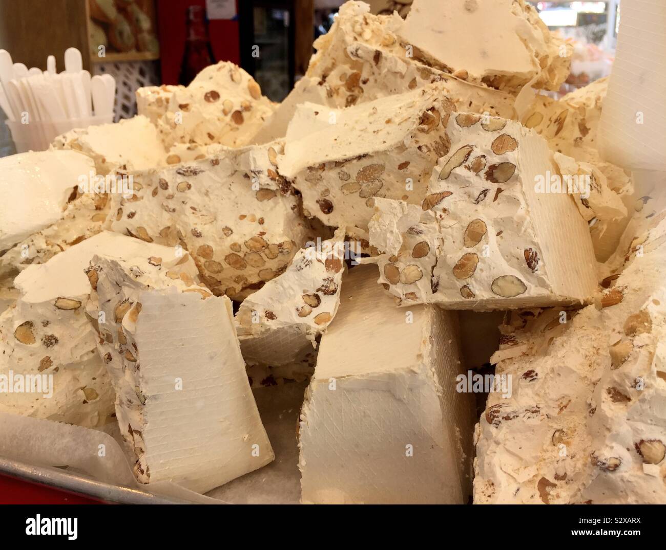 Torrone is an Italian nougat candy that is a specialty item for the holidays, Little Italy, New York City, USA - Smartphone Captured Stock Image