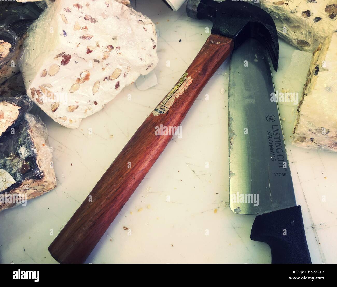 Torrone Is an Italian nougat candy that is so difficult to break you need a  hammer and chisel, Little Italy, New York City, USA Stock Photo - Alamy