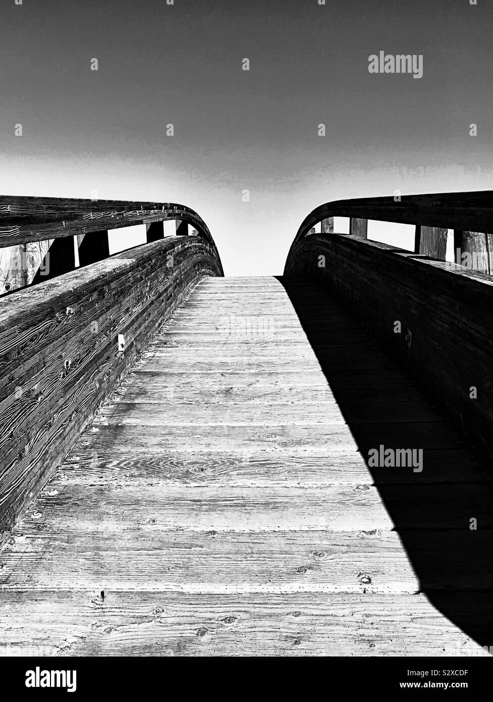 Wooden bridge with shadows Stock Photo