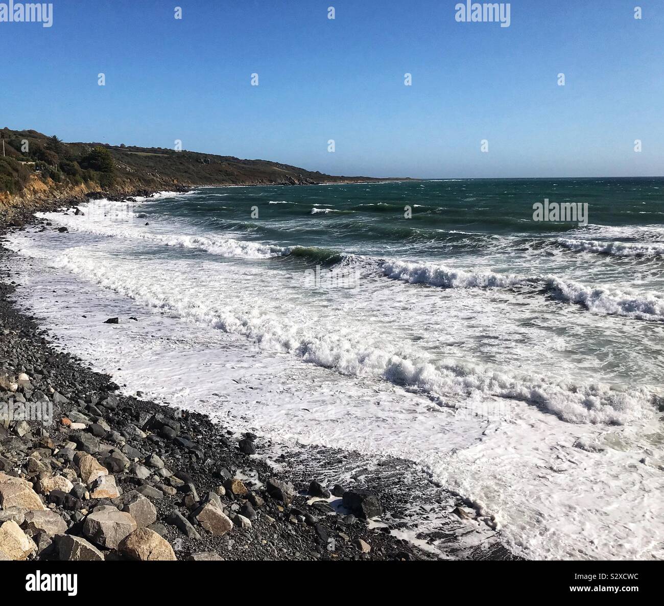 Crashing Waves and White Surf Of The Atlantic Ocean At Coverack In Cornwall UK - Smartphone Captured Stock Image