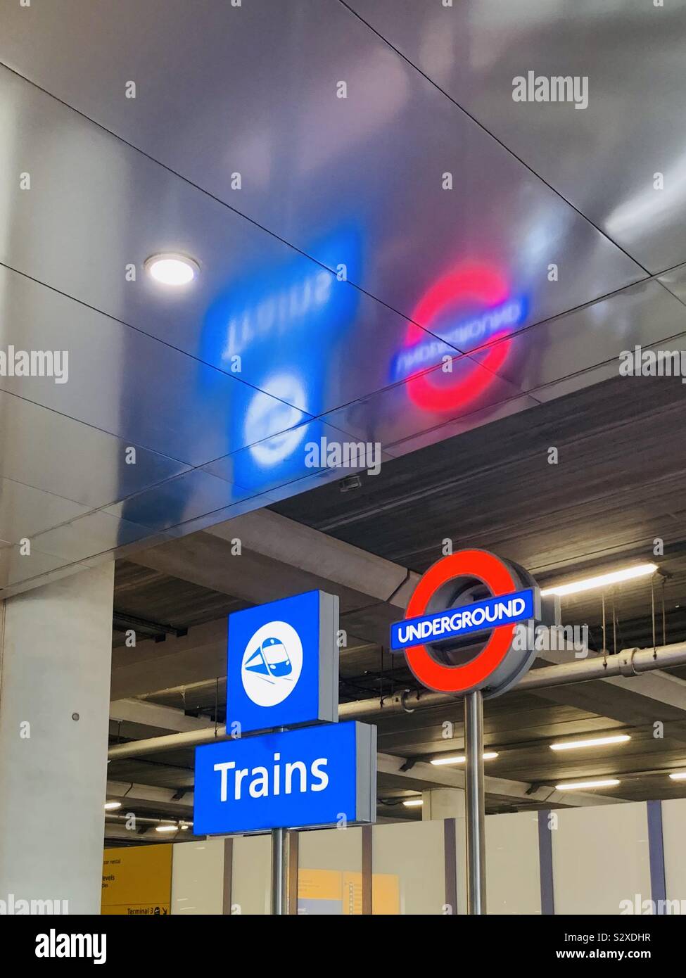 London, UK : 21 September 2019: Trains and Underground signs at Heathrow airport Terminal 2. Stock Photo