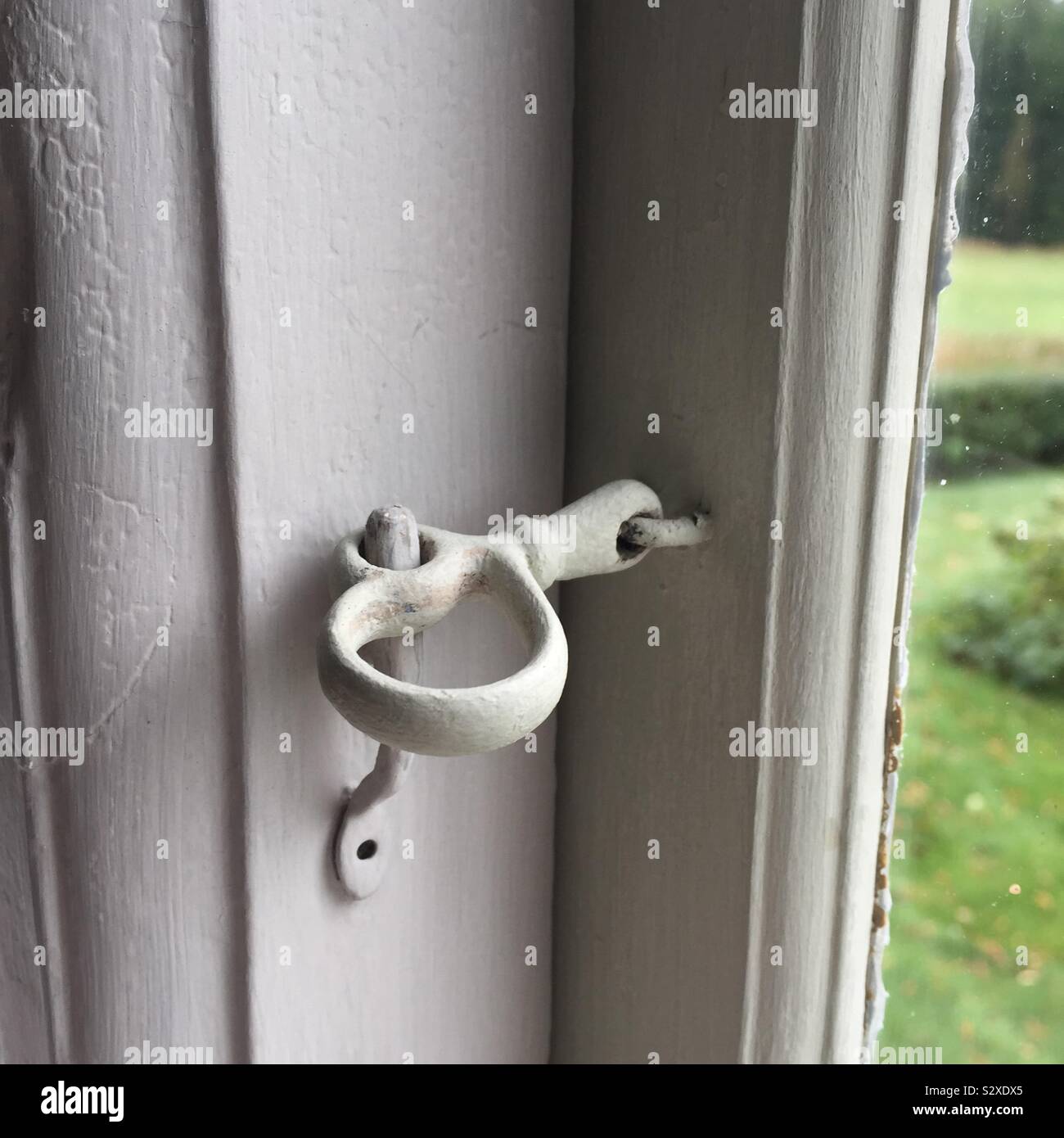 Old window catch. - Smartphone Captured Stock Image