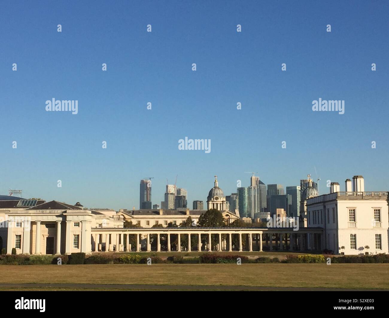 Greenwich maritime museum and queens house with Canary Wharf in background - Smartphone Captured Stock Image