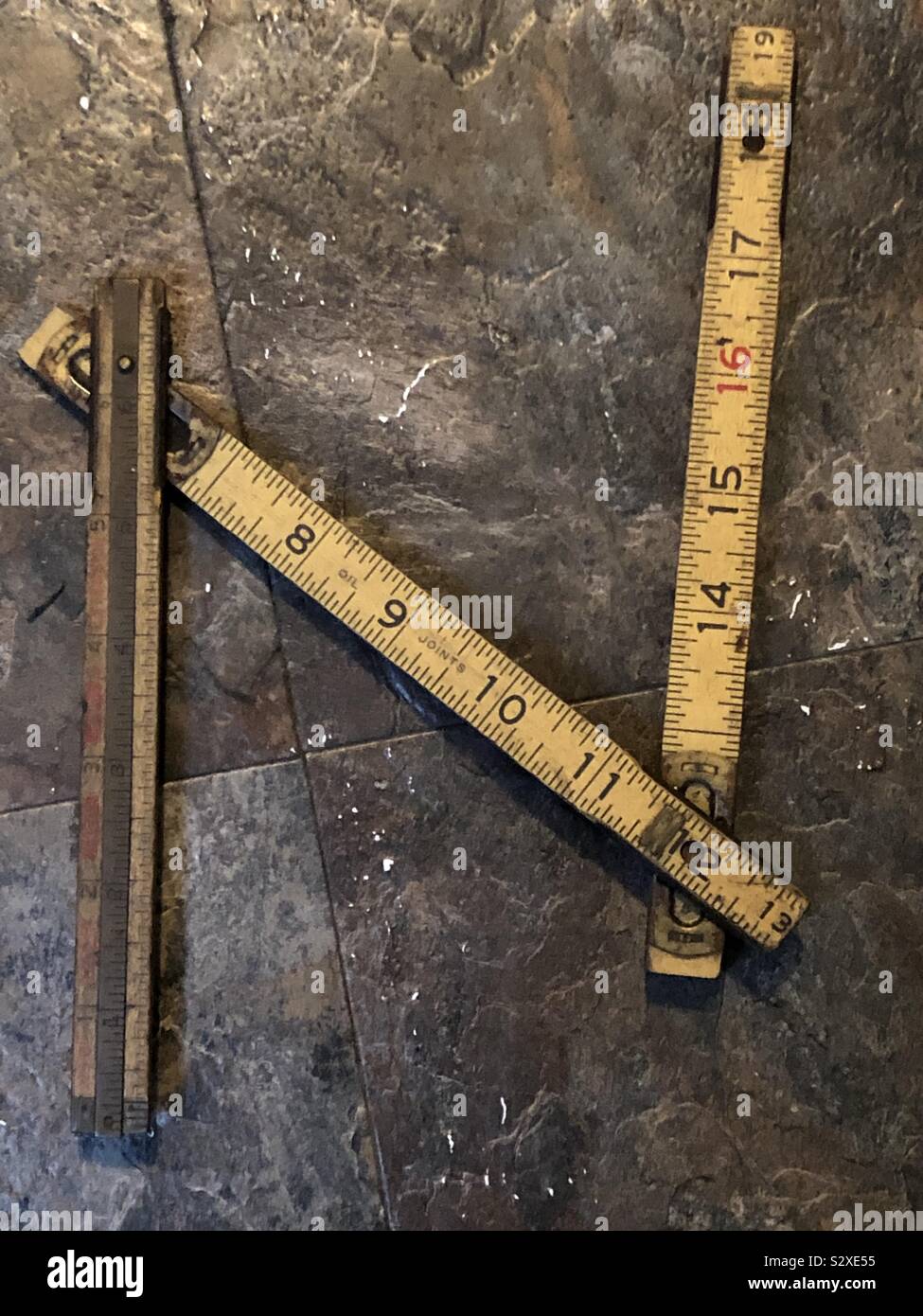 Vintage carpenter ruler unfolded Stock Photo Alamy