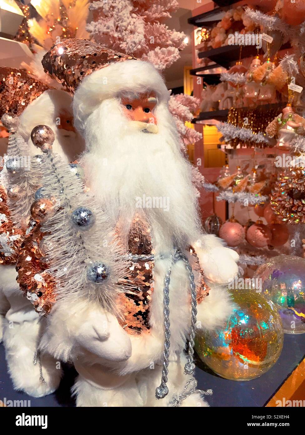 Macy’s holiday Lane features elaborate Christmas ornaments in Santa Claus figurines, New York City, USA Stock Photo