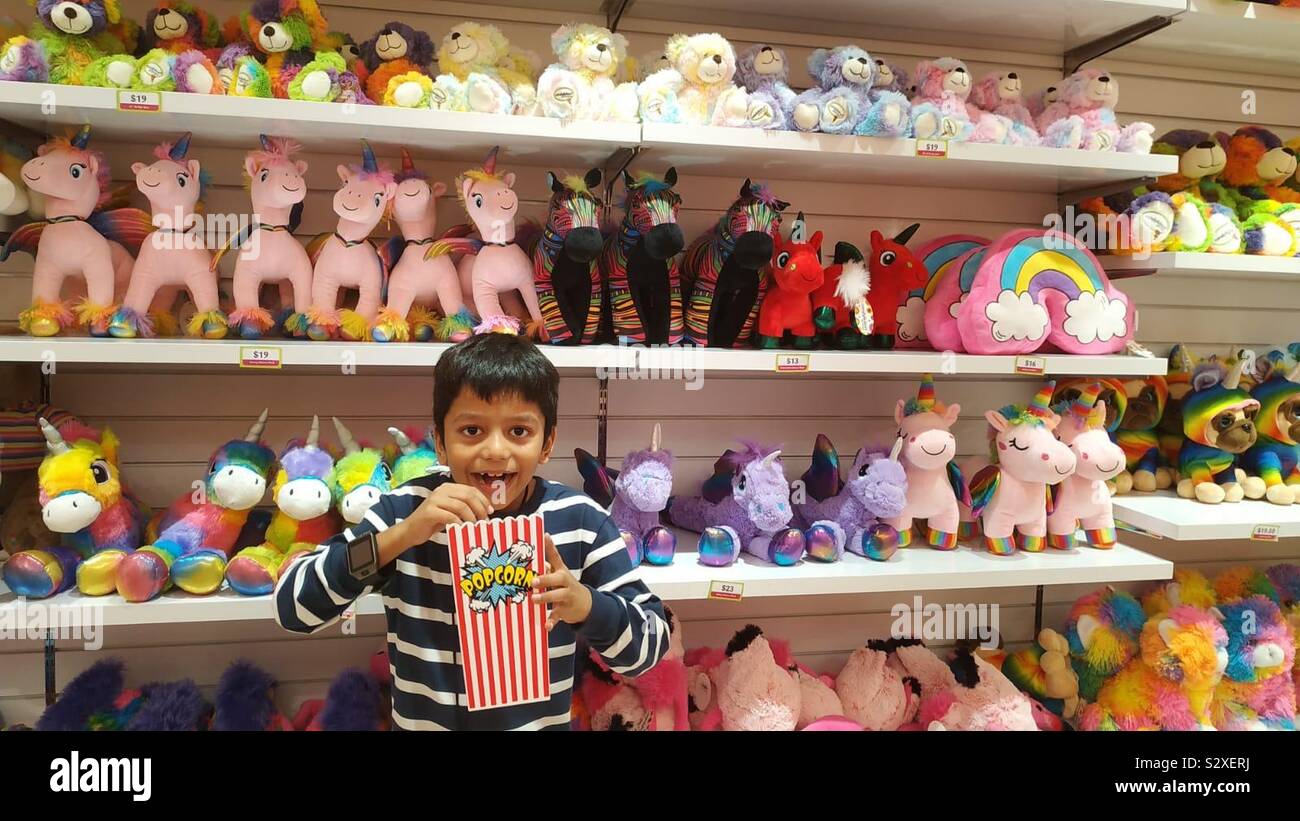 Boy exploring toys - Smartphone Captured Stock Image