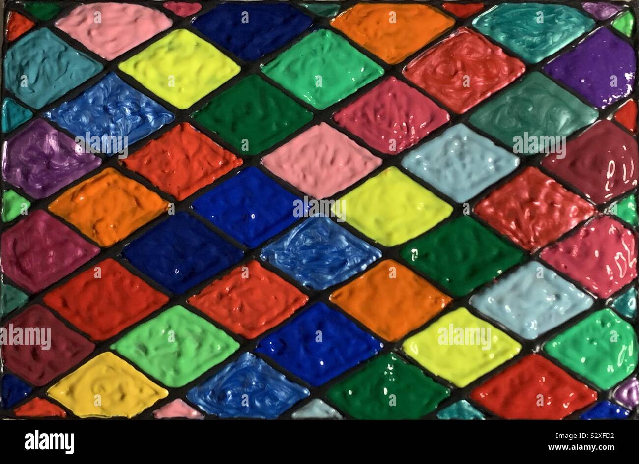 Vibrating colors of textured paint from complementary wavelengths. - Smartphone Captured Stock Image